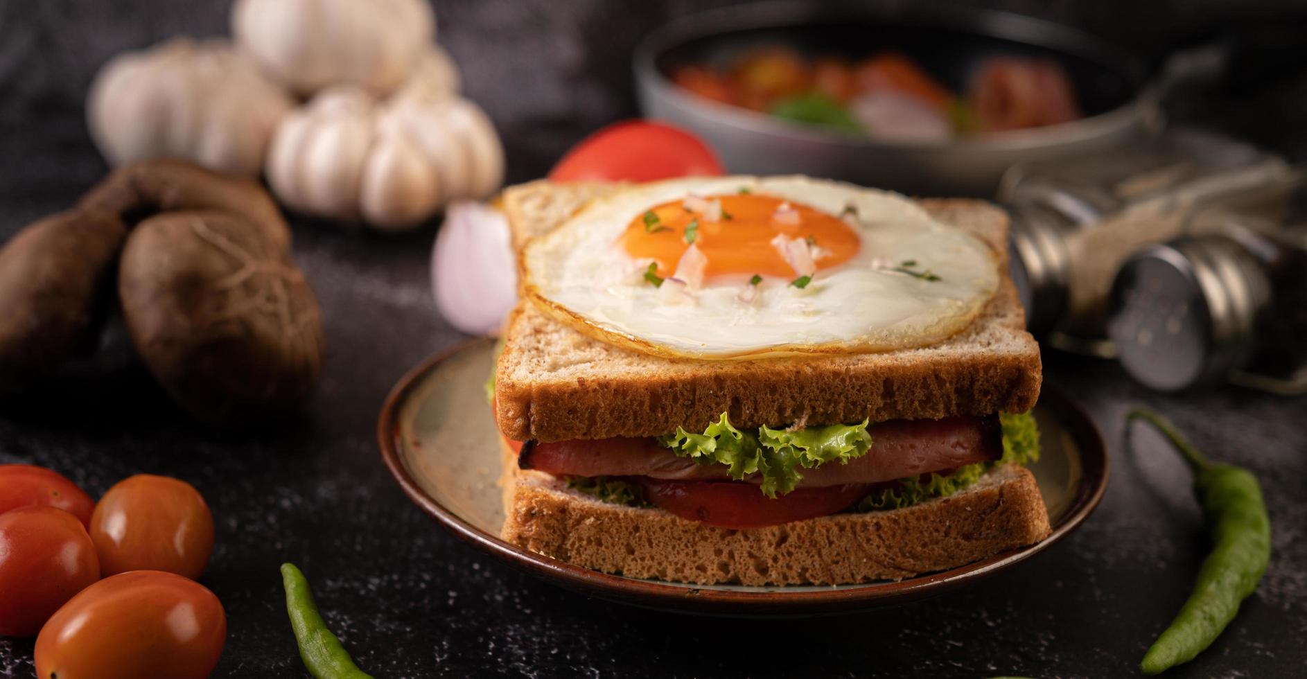 Ham and egg breakfast sandwich 1826789 Stock Photo at Vecteezy