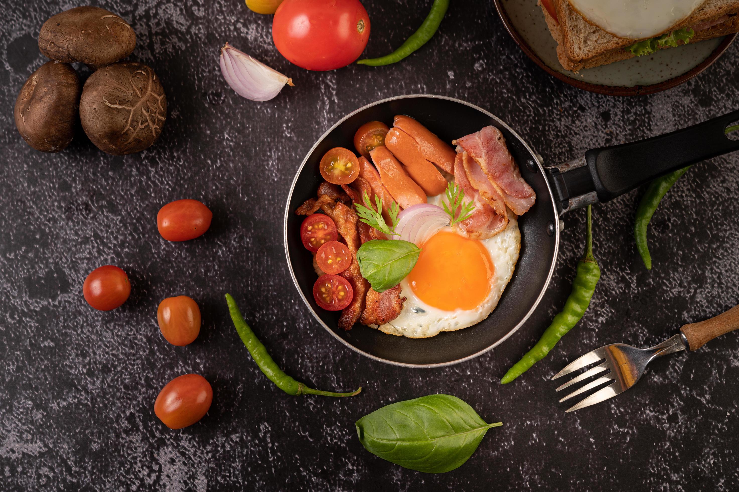 Egg breakfast with sausage and vegetables 1826883 Stock Photo at Vecteezy