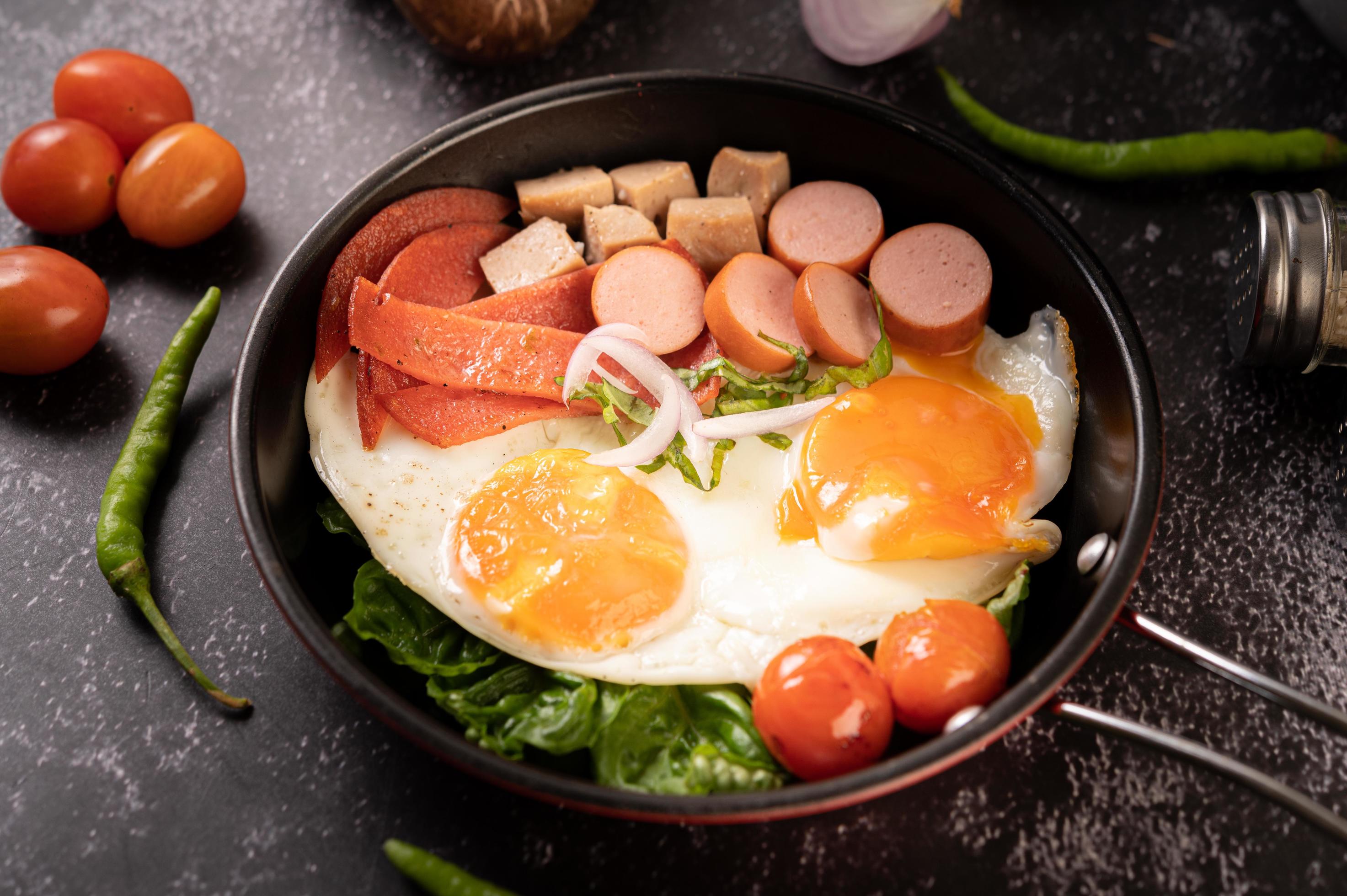 Egg breakfast with sausage and vegetables 1826908 Stock Photo at Vecteezy
