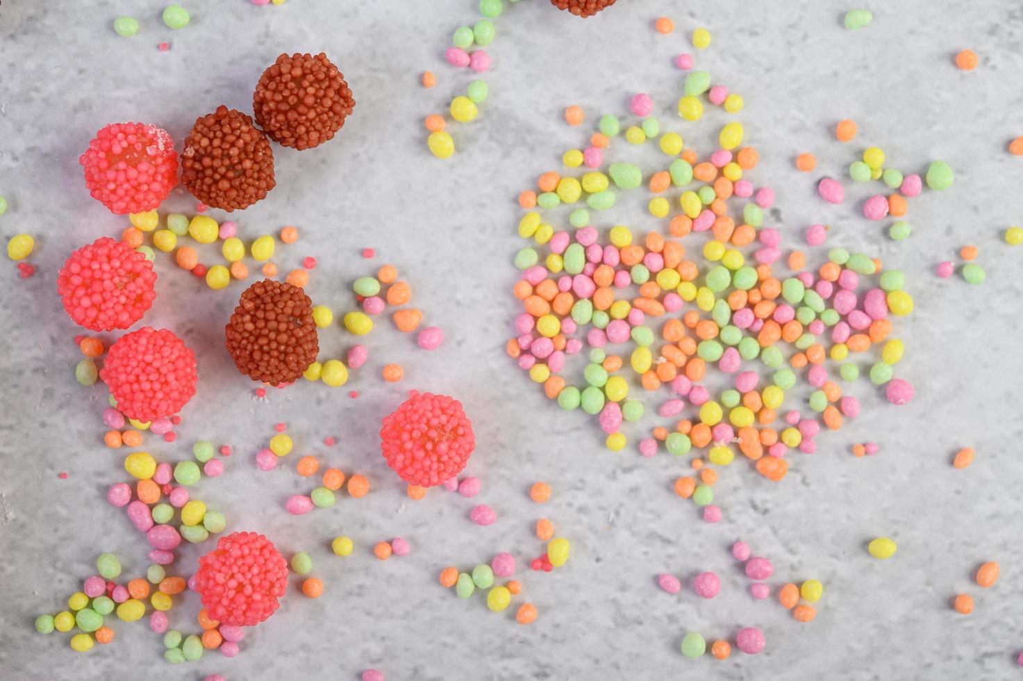 Colorful confectionary on gray background photo