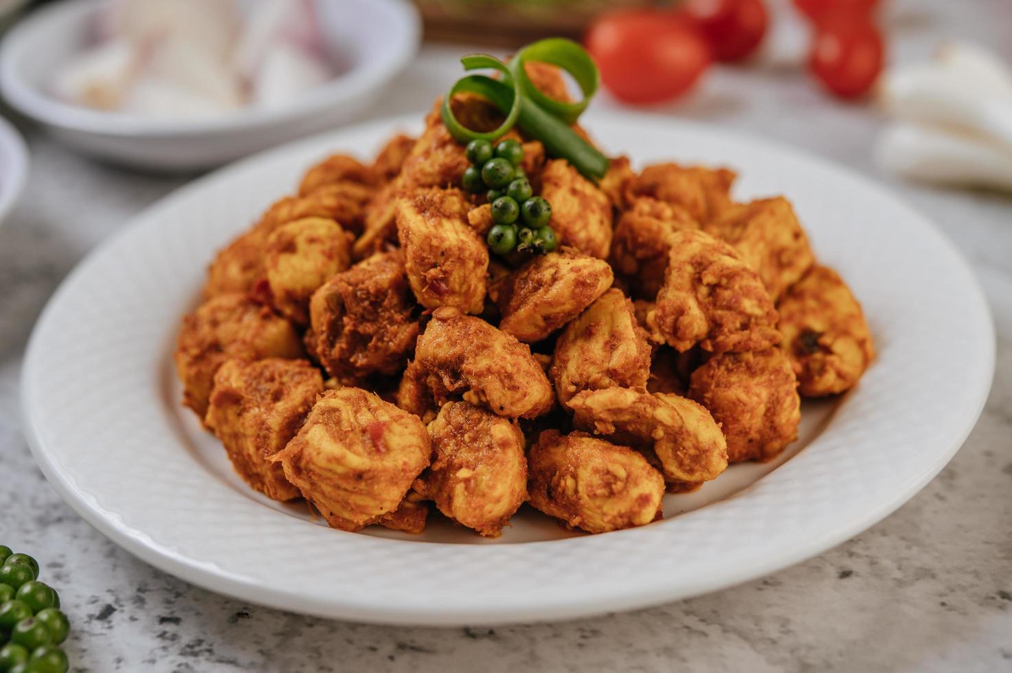 Herb-fried chicken and vegetables photo