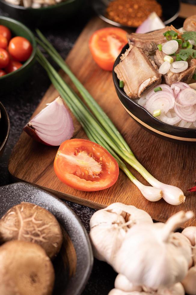 Scallions, peppers, garlic, and shiitake mushrooms photo