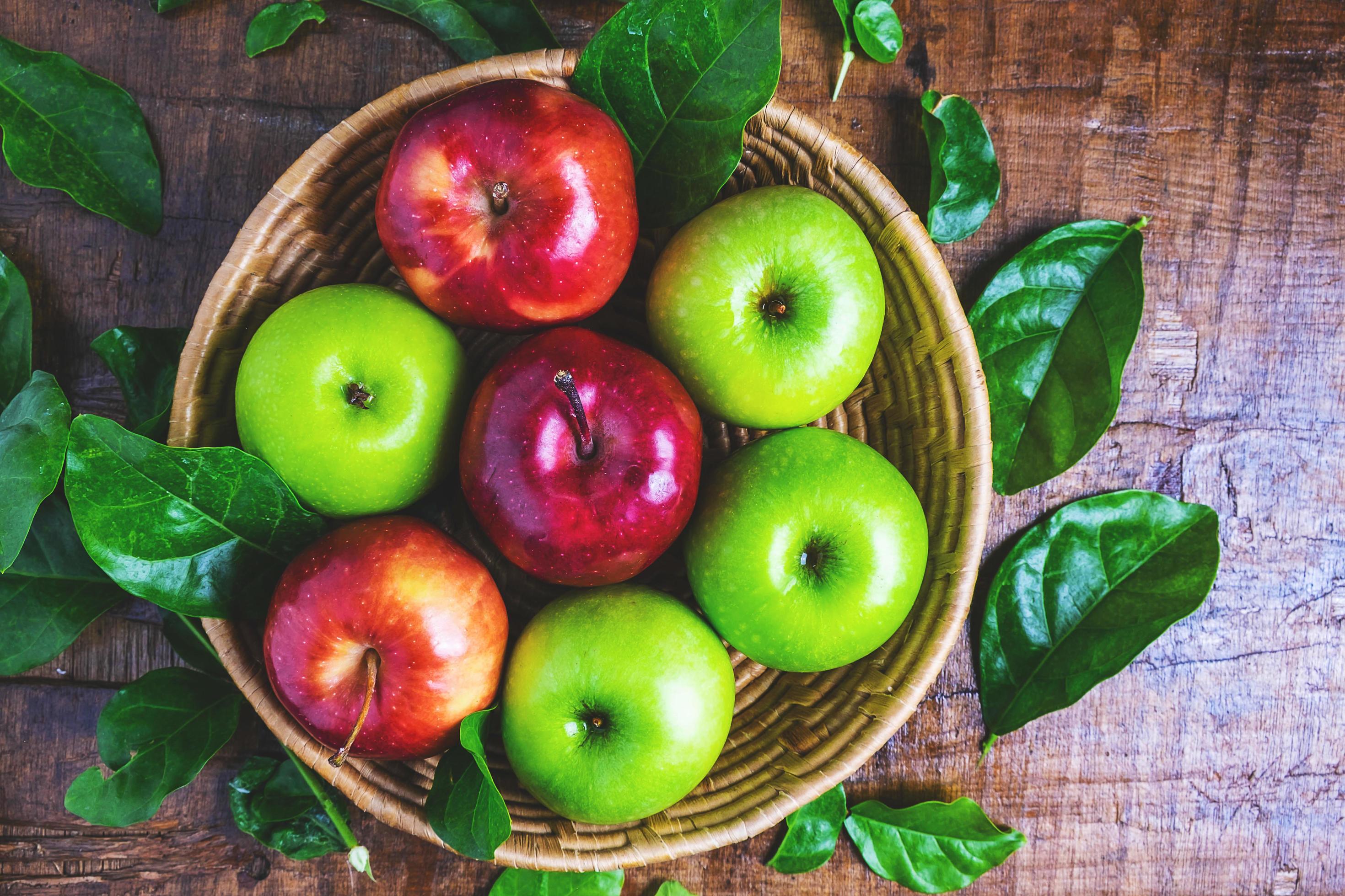 Basket of green and red apples 1827323 Stock Photo at Vecteezy