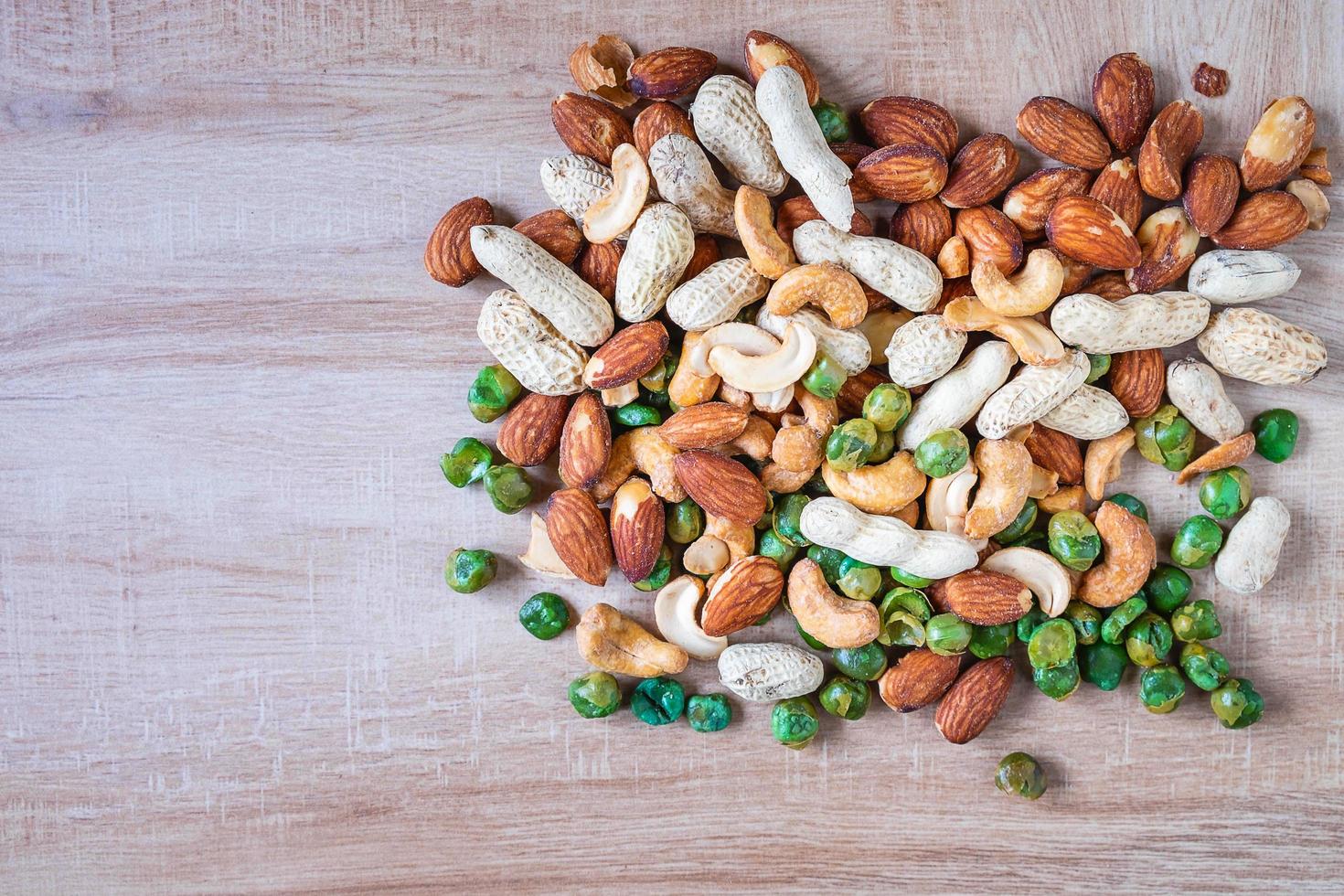 Nuts on a wooden table photo