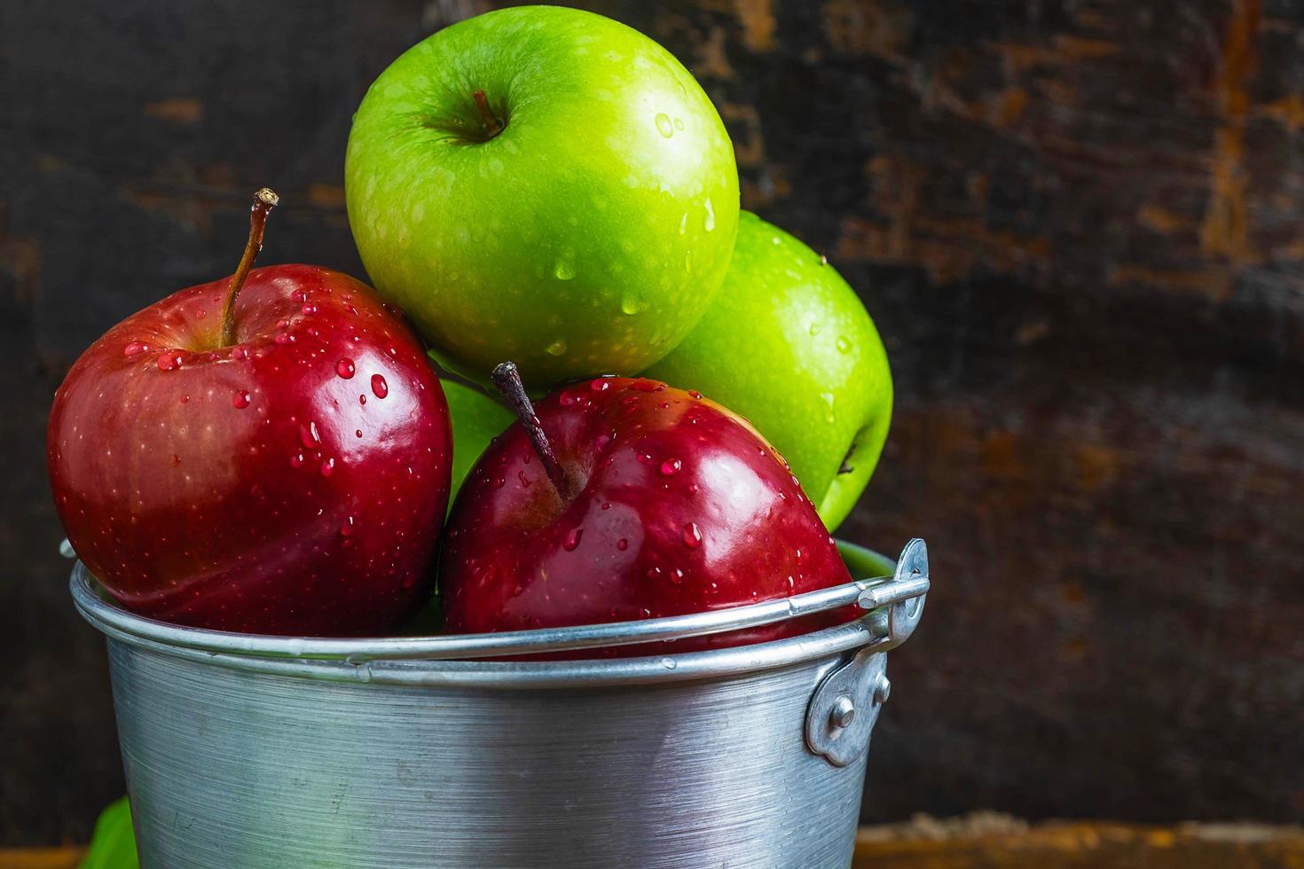 Metal bowl of apples photo