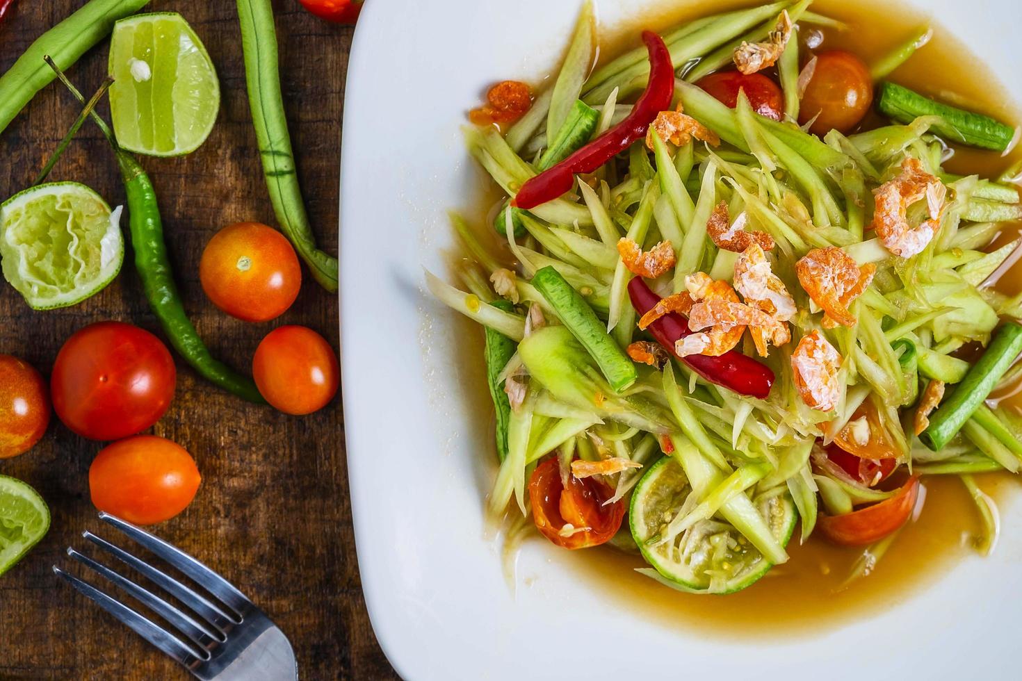 Top view of a bowl of papaya salad photo