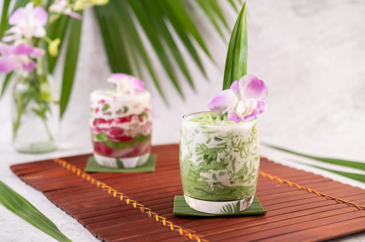 Dessert in a glass on a banana leaf photo