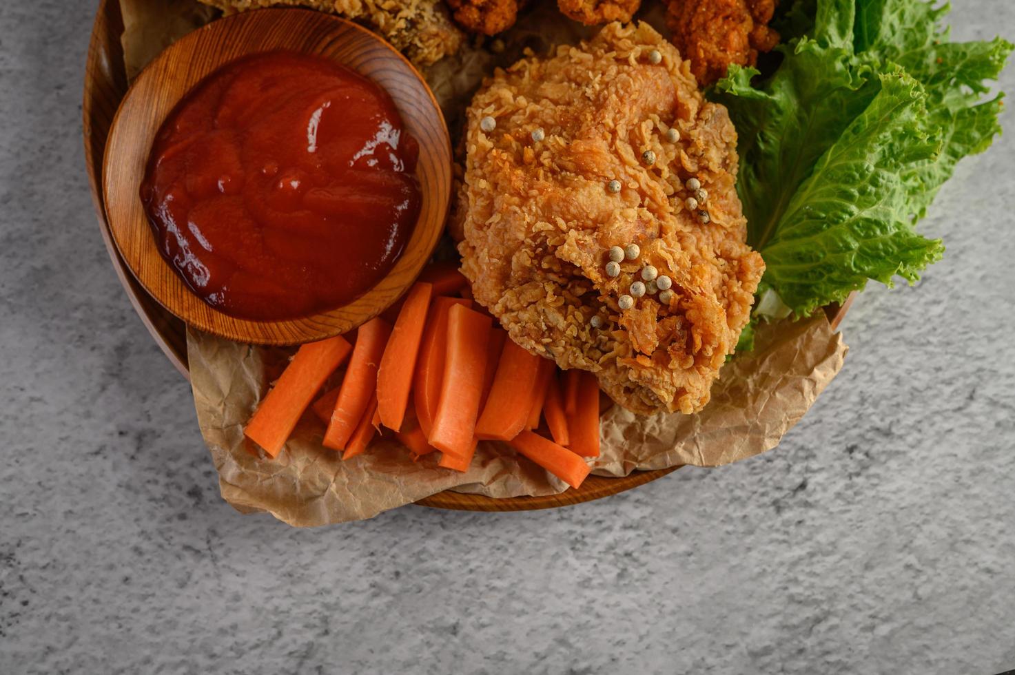 Crispy fried chicken with sauce photo