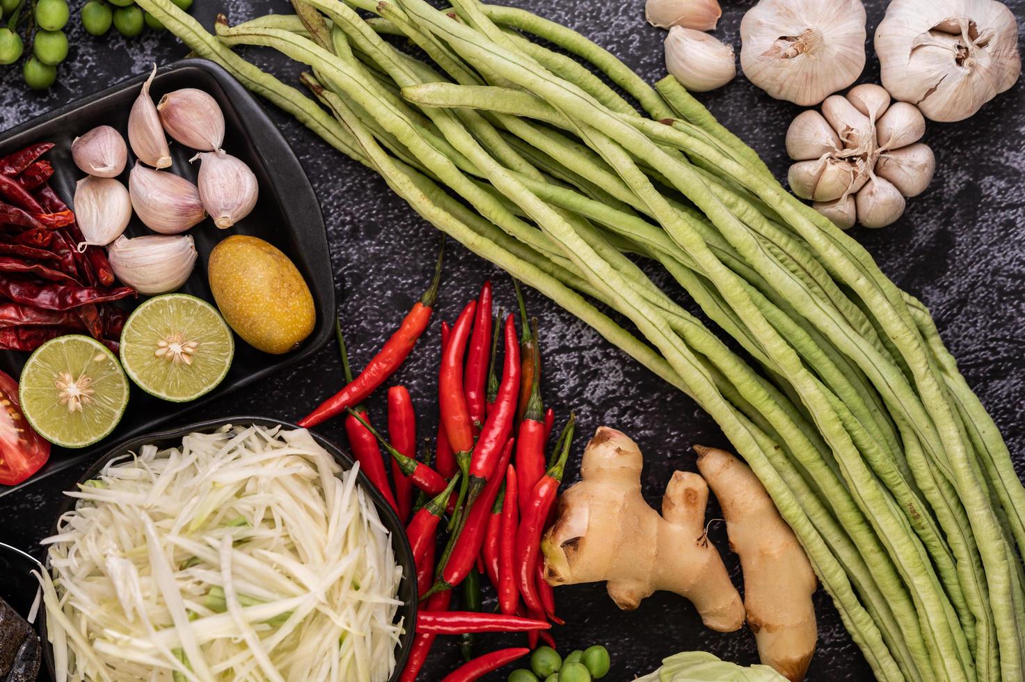 Papaya salad ingredients with fermented fish photo