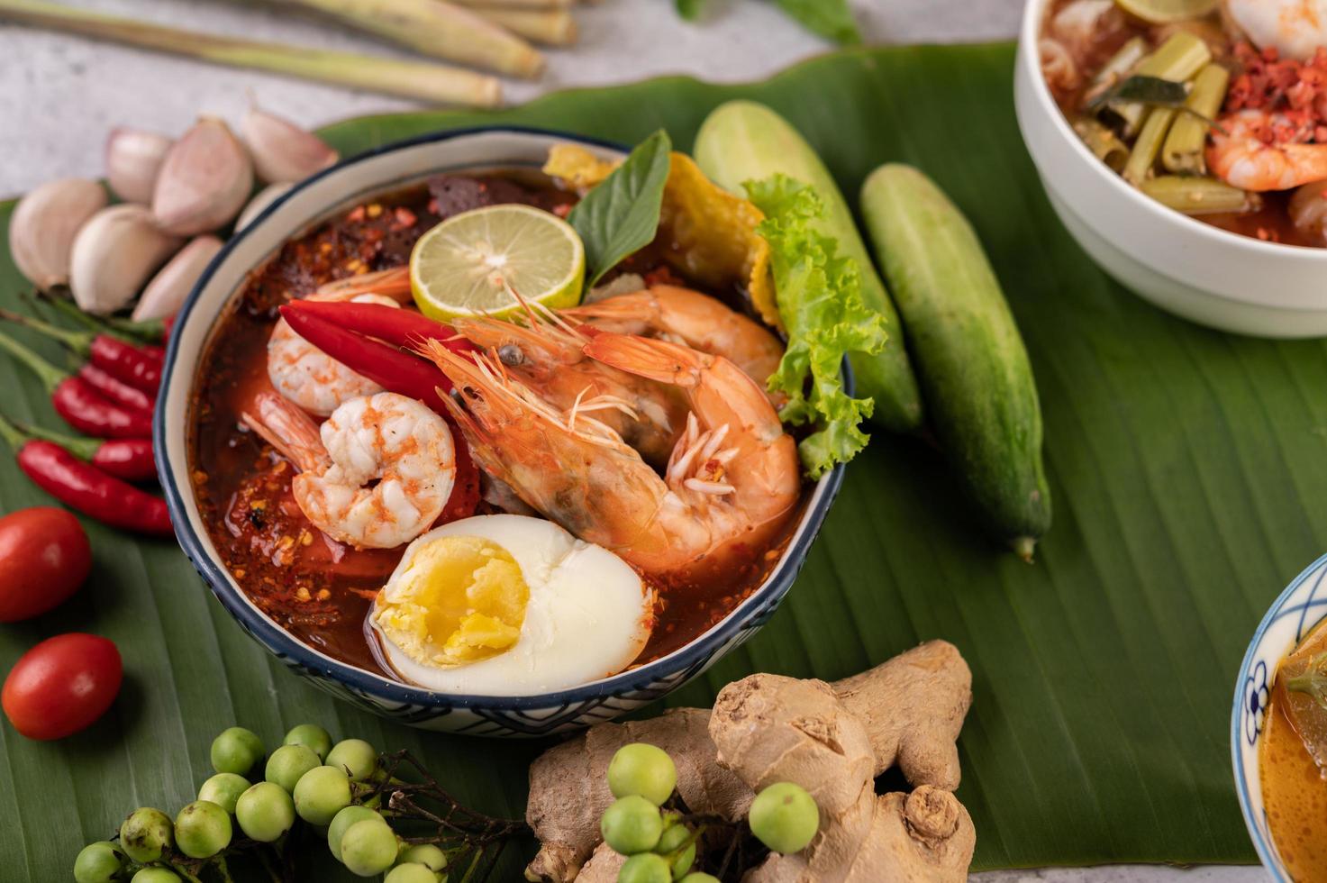 Tom yum noodles with shrimp and boiled eggs photo