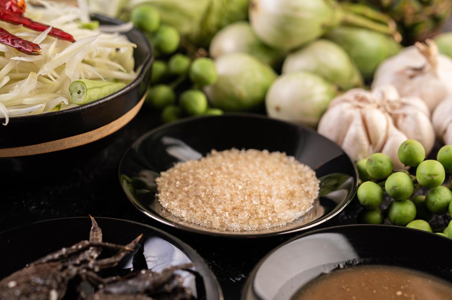 Papaya salad ingredients with fermented fish photo