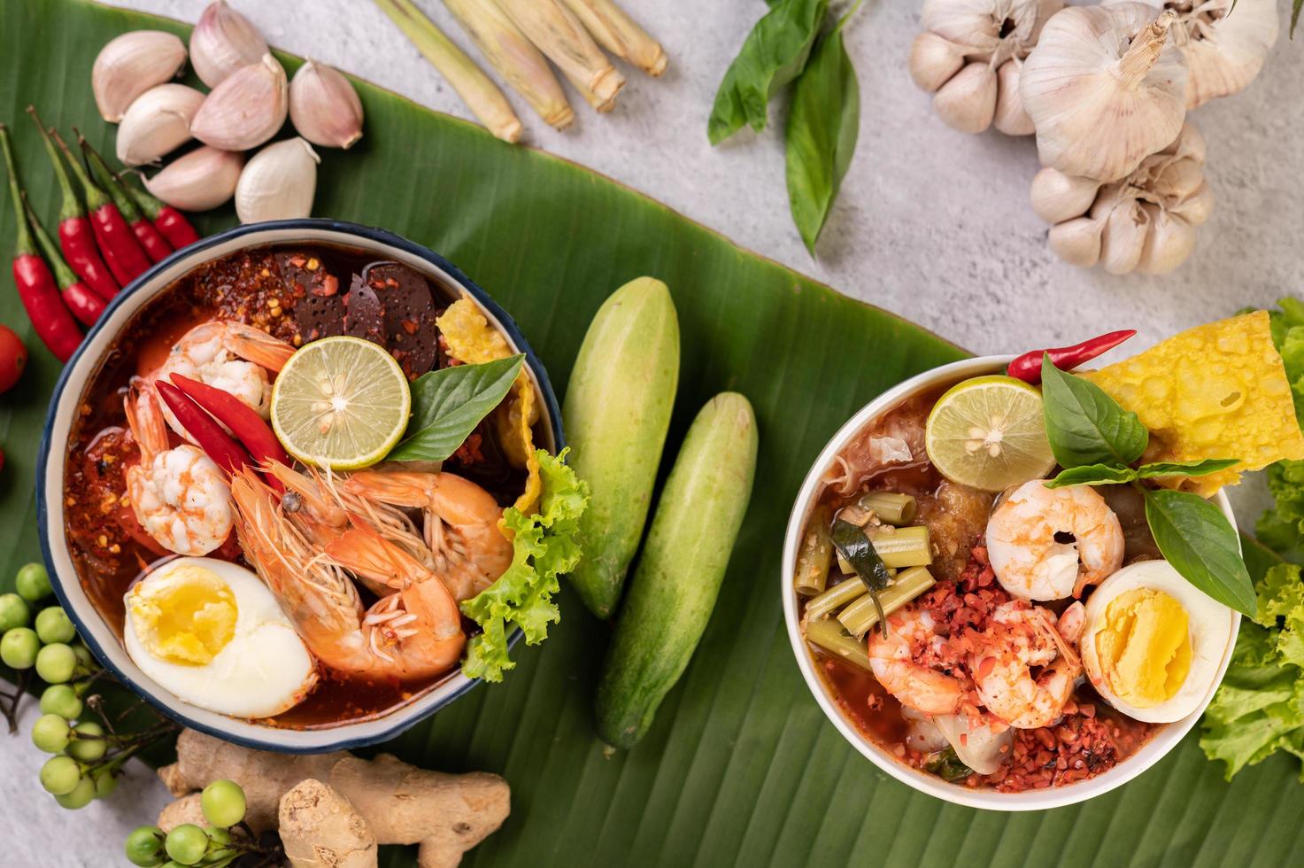 Tom yum noodles with shrimp and boiled eggs photo