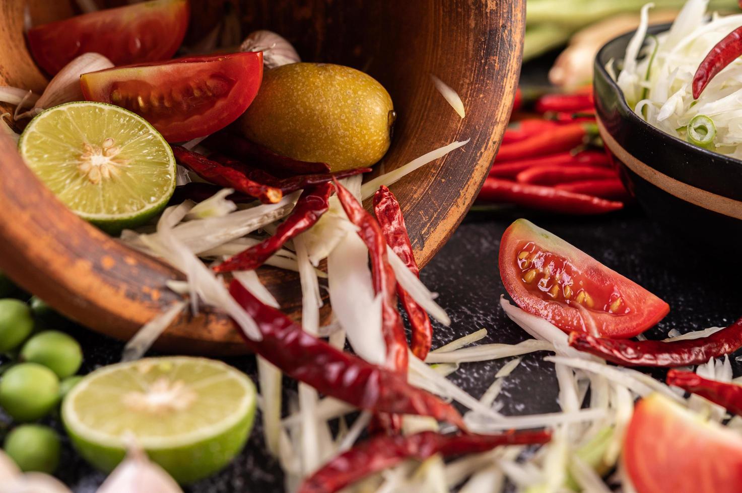 Papaya salad ingredients with fermented fish photo