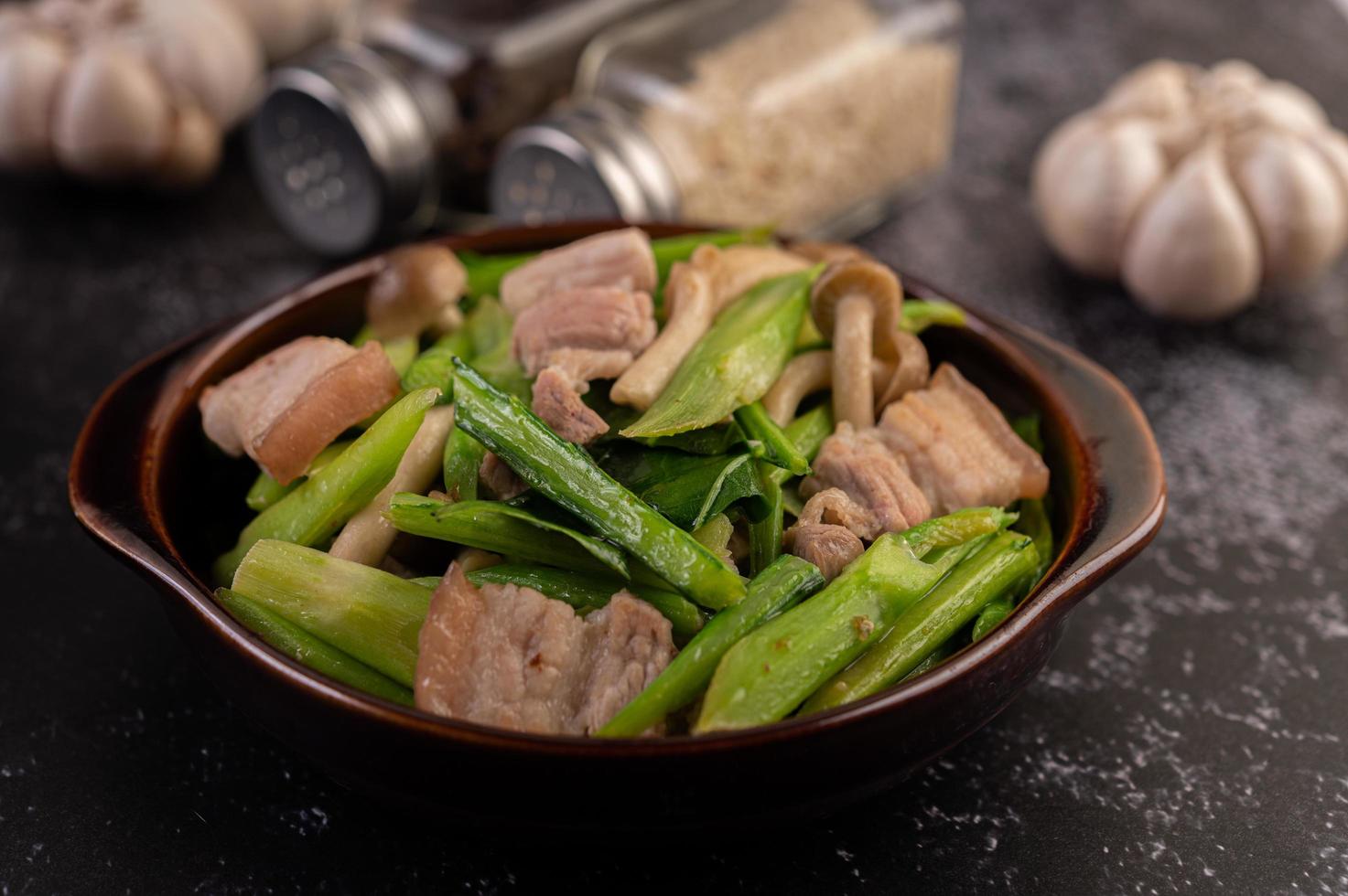 Stir-fried kale and pork belly photo