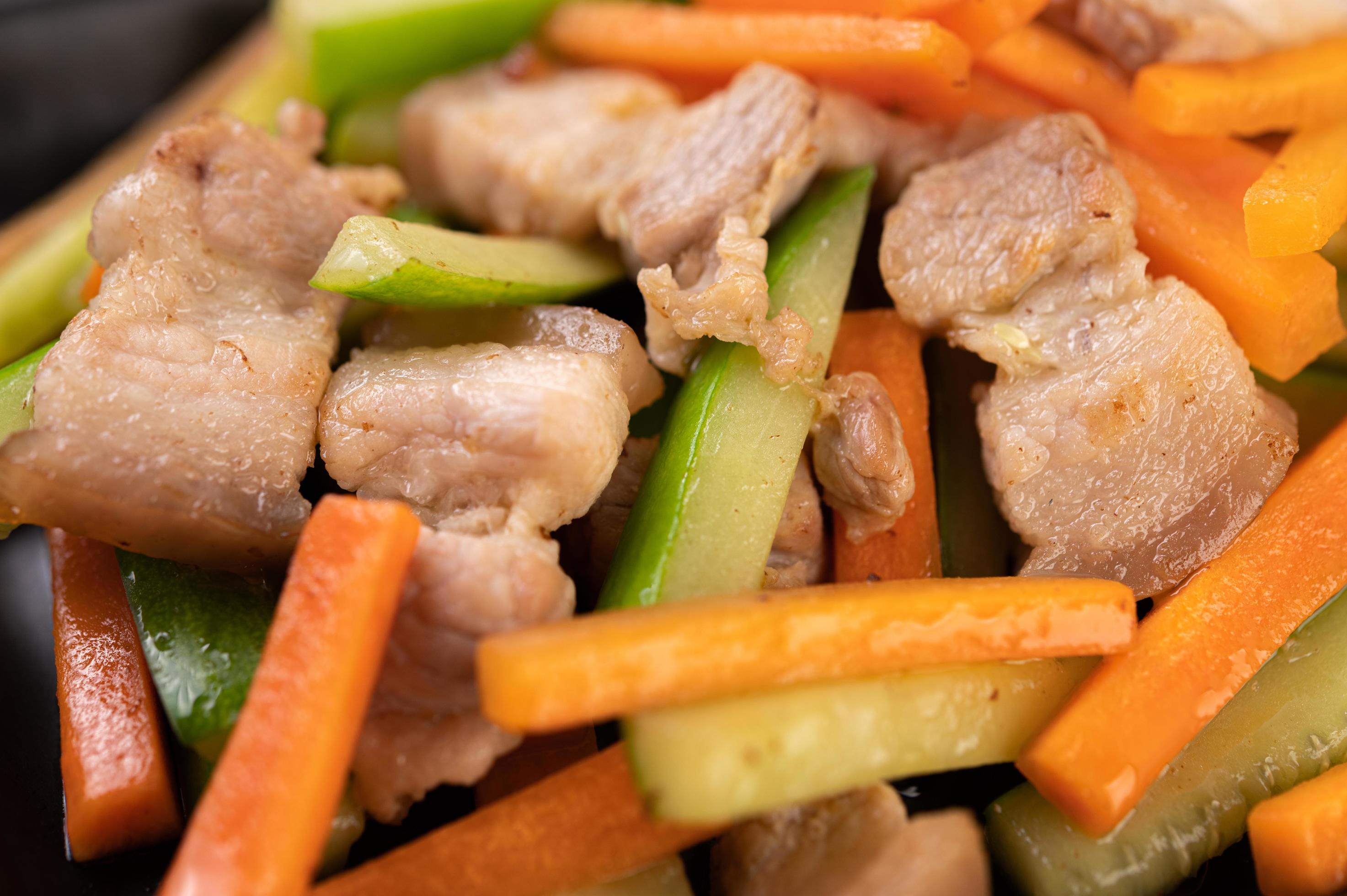 Stir fry vegetables with pork belly 1831625 Stock Photo at Vecteezy