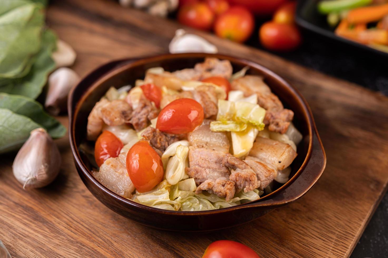 Stir fry cabbage with pork belly photo