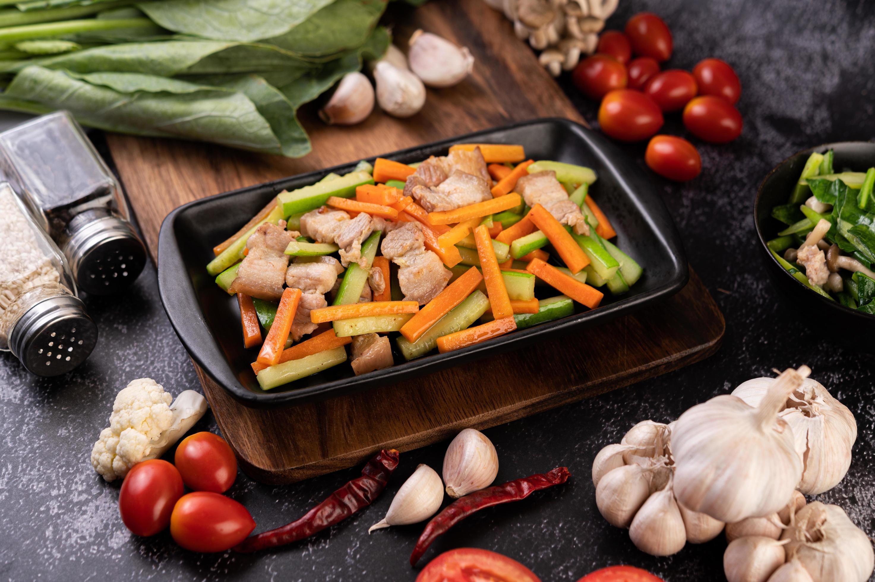 Stir fry vegetables with pork belly 1831634 Stock Photo at Vecteezy