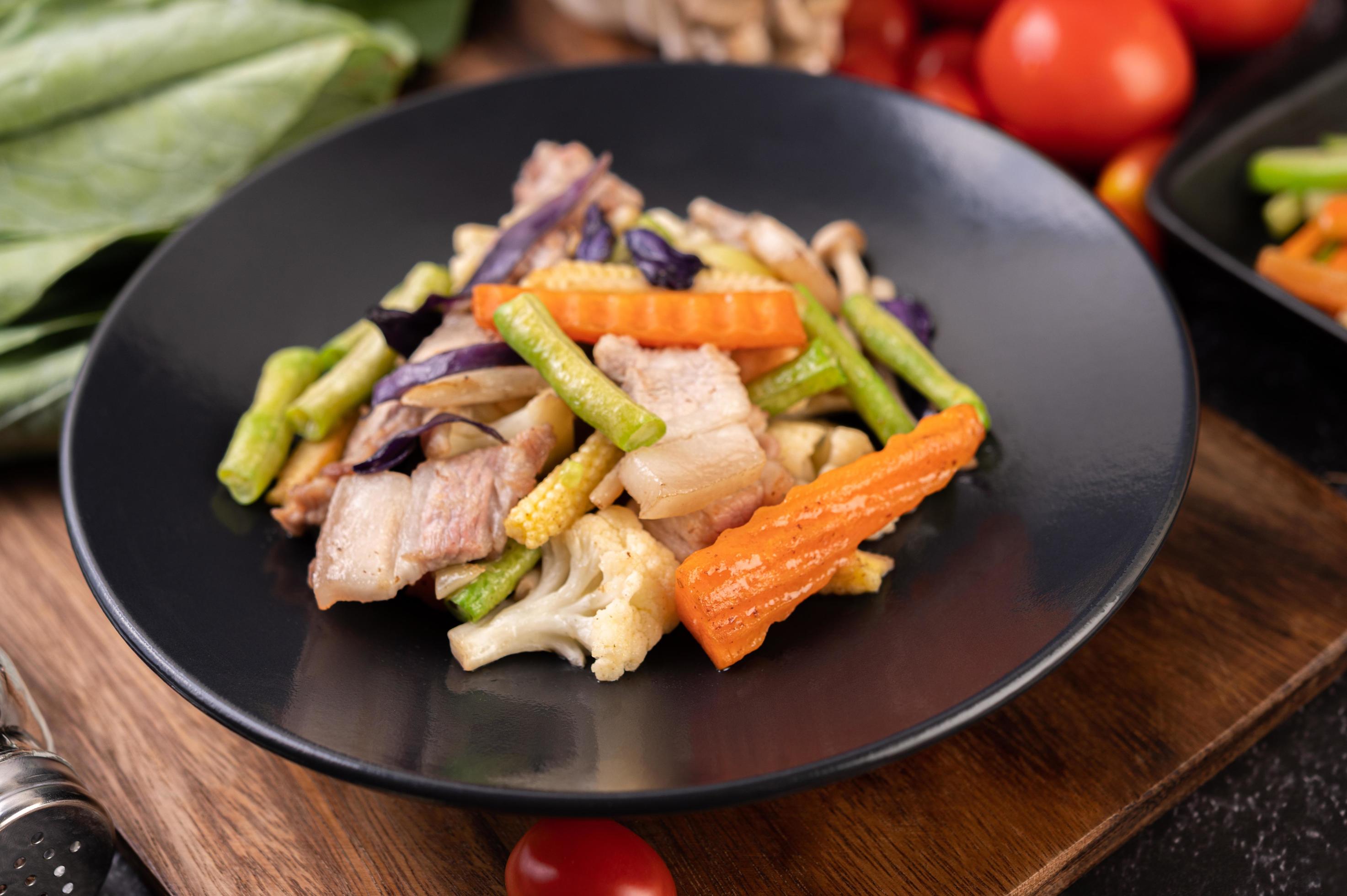 Stir fry vegetables with pork belly 1831676 Stock Photo at Vecteezy