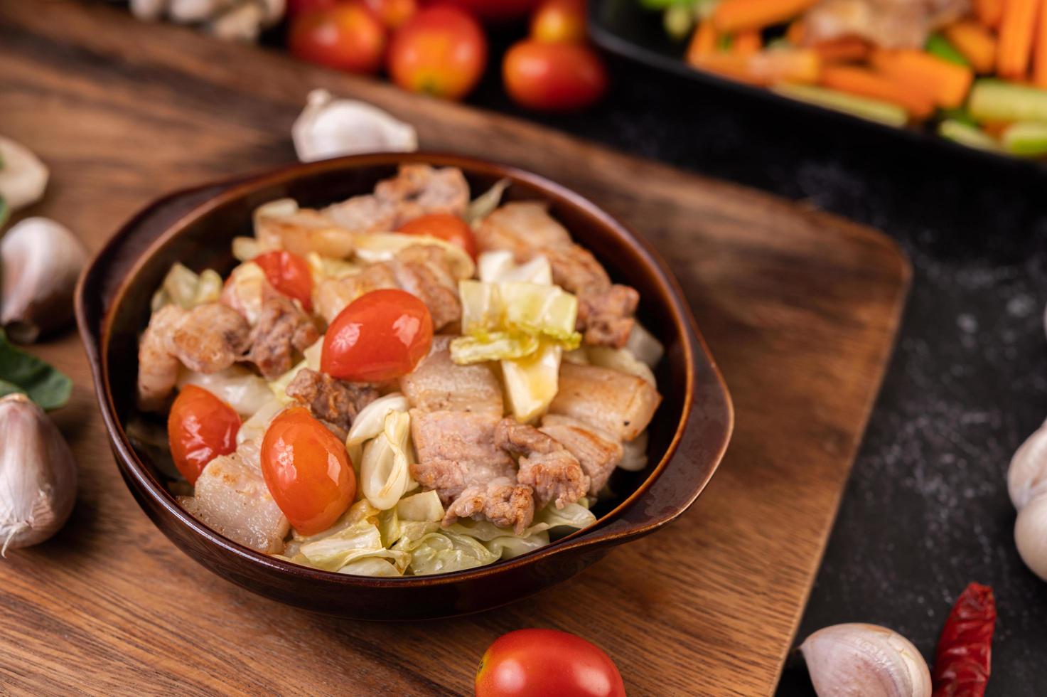 Stir fry cabbage with pork belly photo