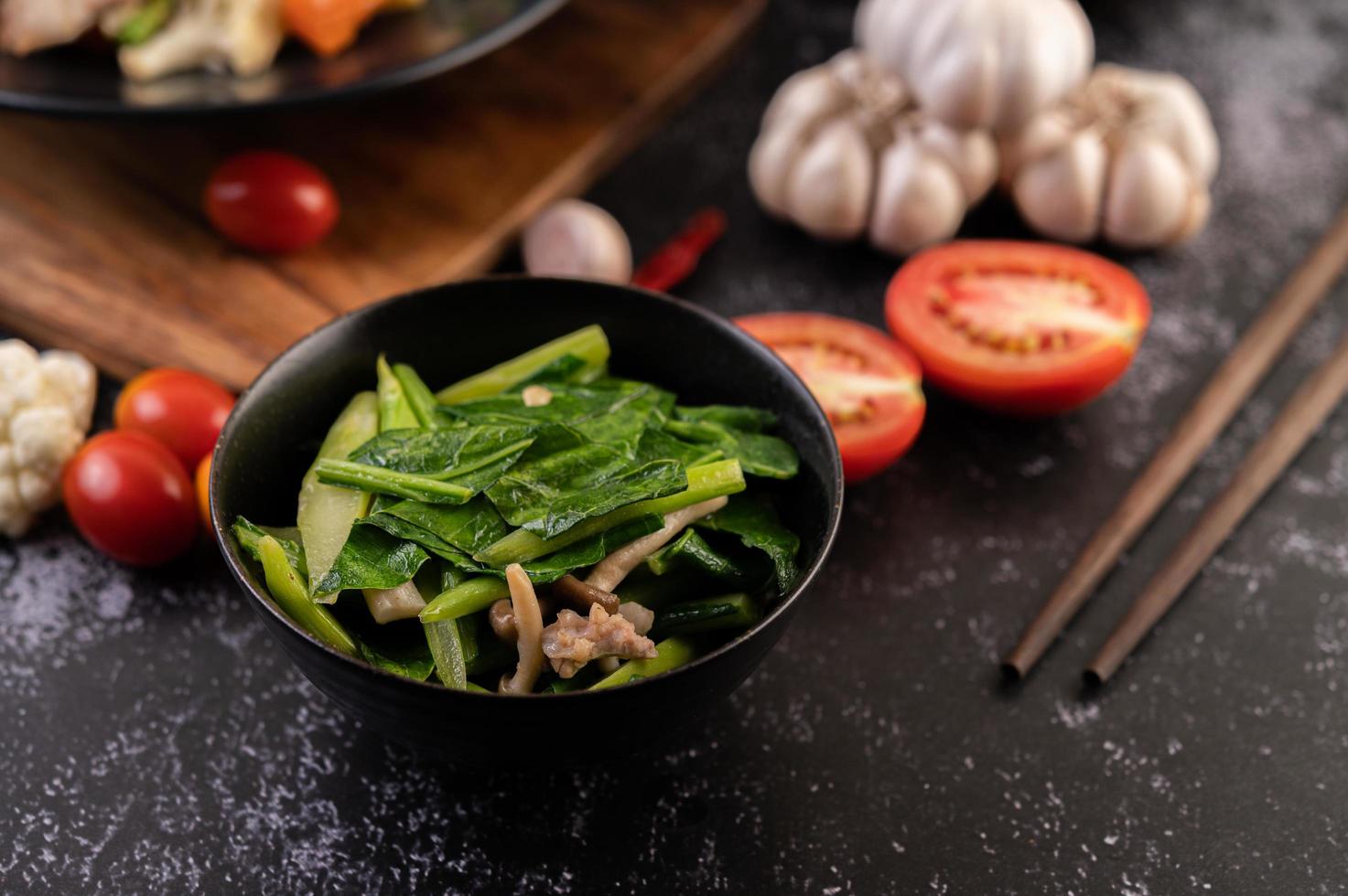 Stir-fried kale and pork belly photo