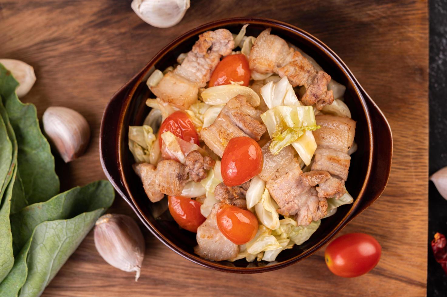 Stir fry cabbage with pork belly photo