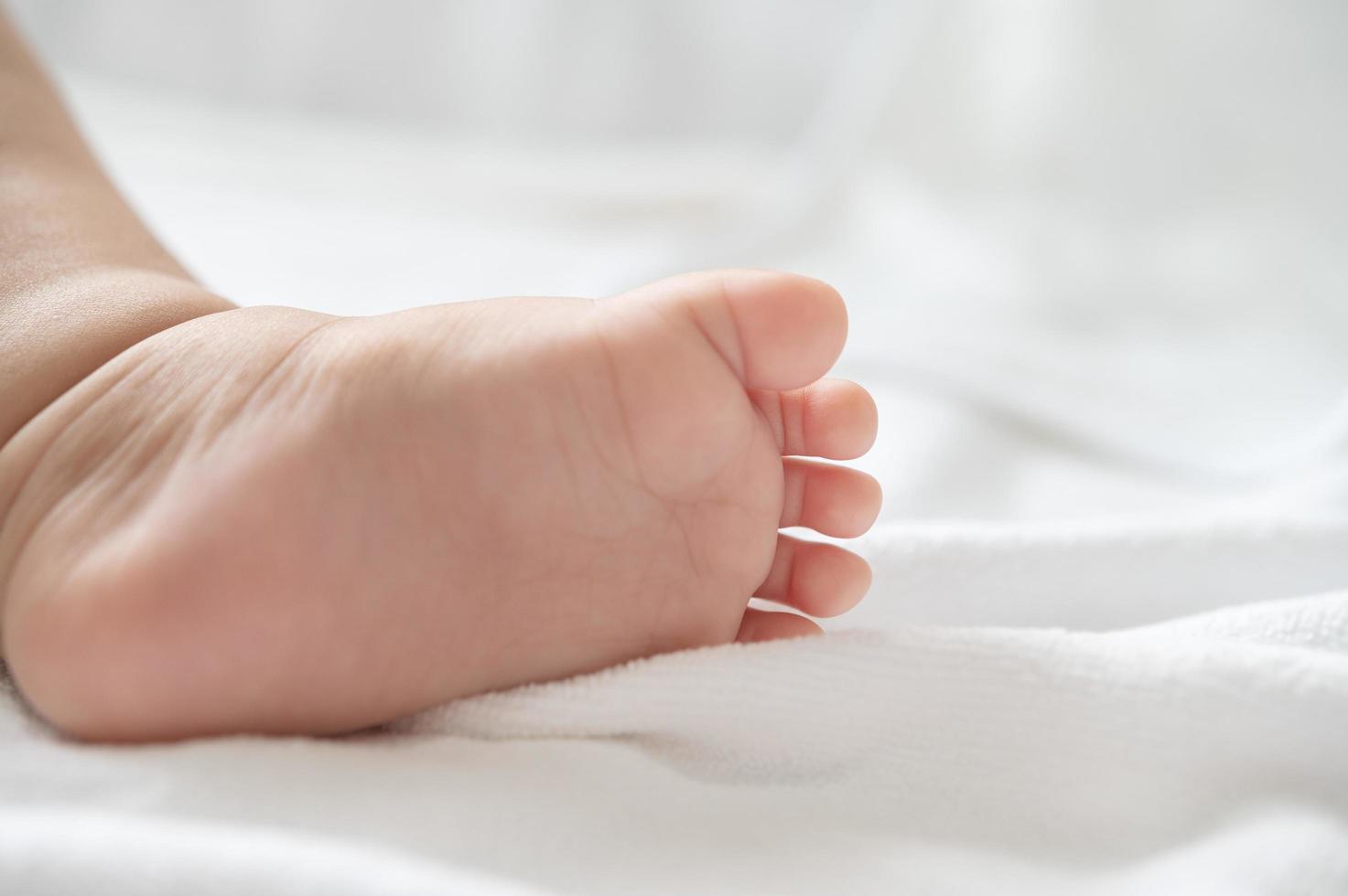 Baby feet close-up photo