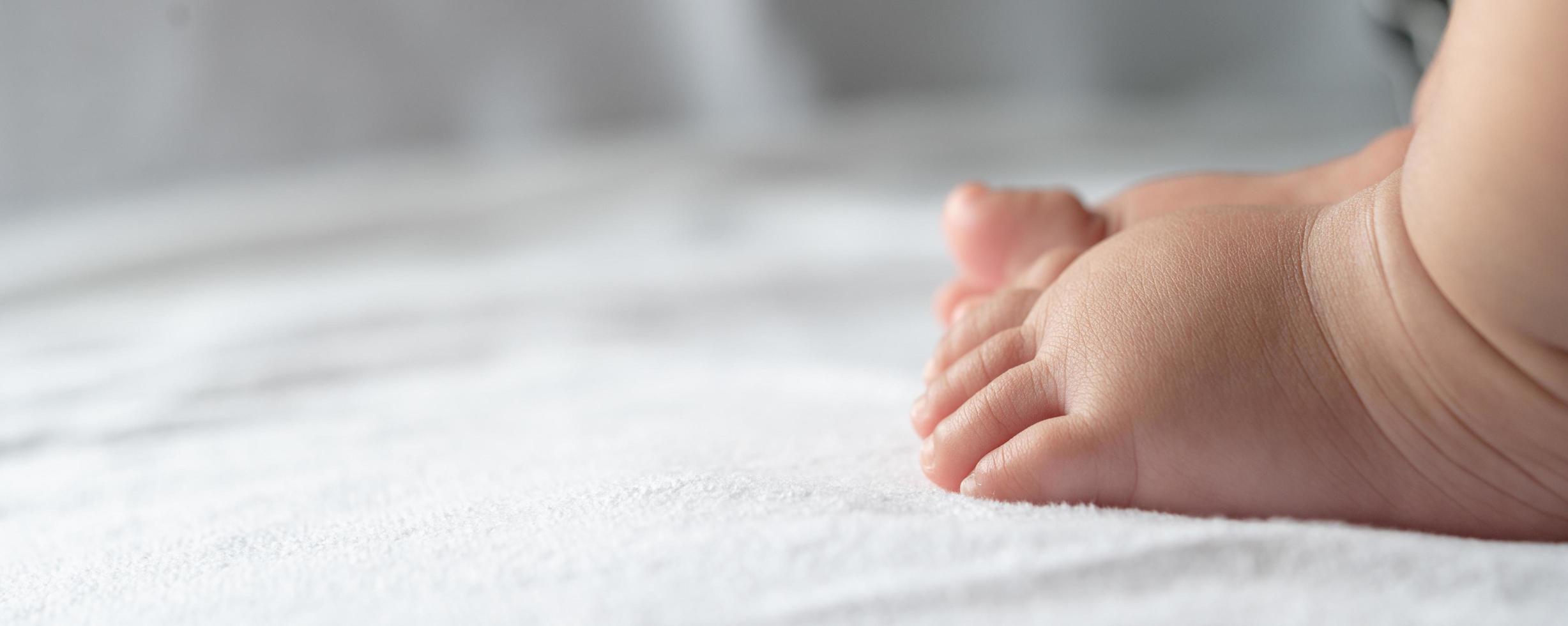 Baby feet close-up photo