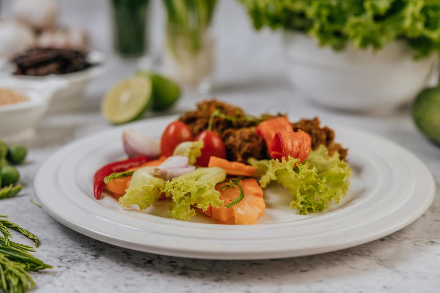 Herb fried pork with vegetables photo