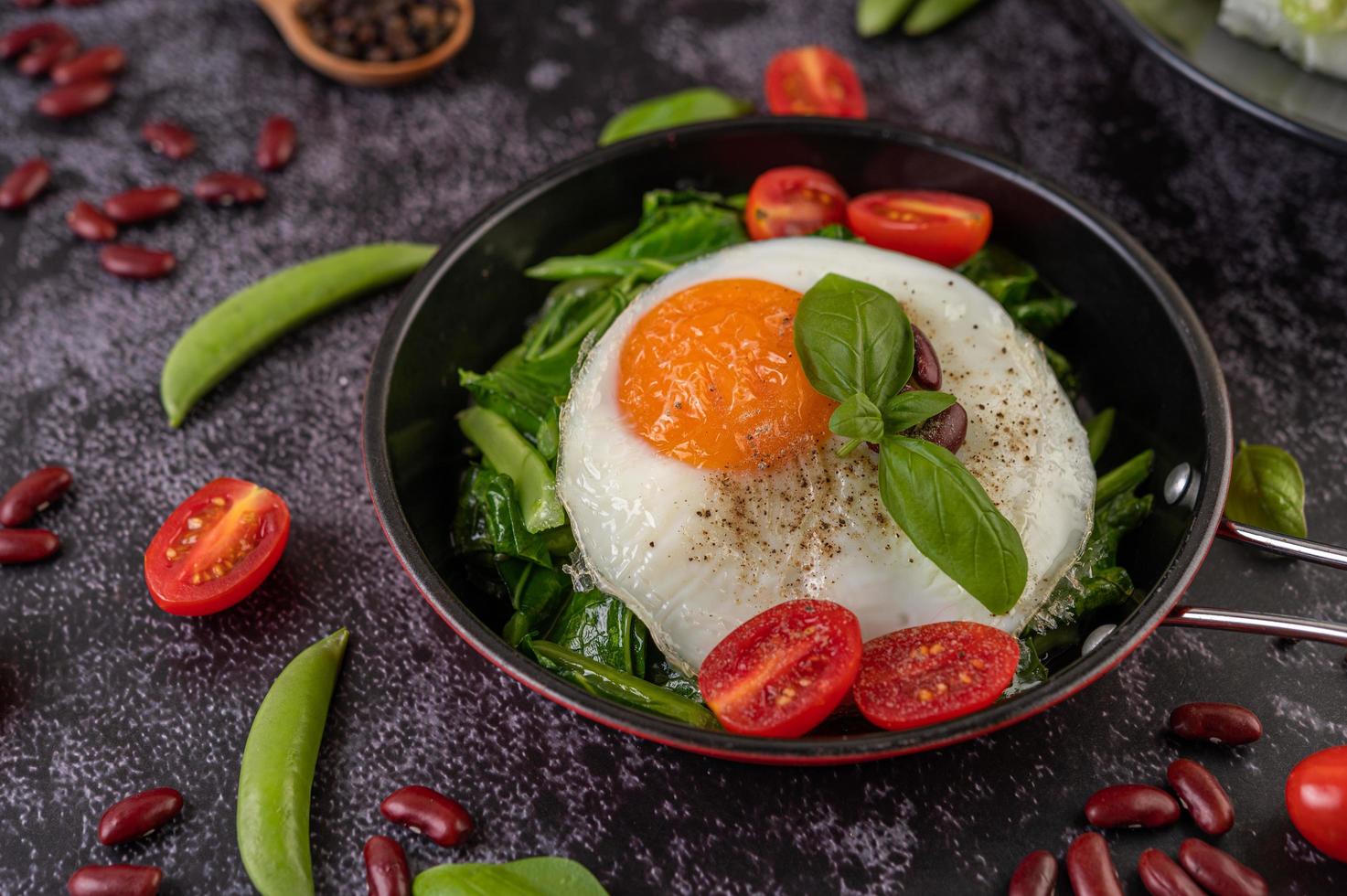 Stir fry kale with egg and tomatoes photo