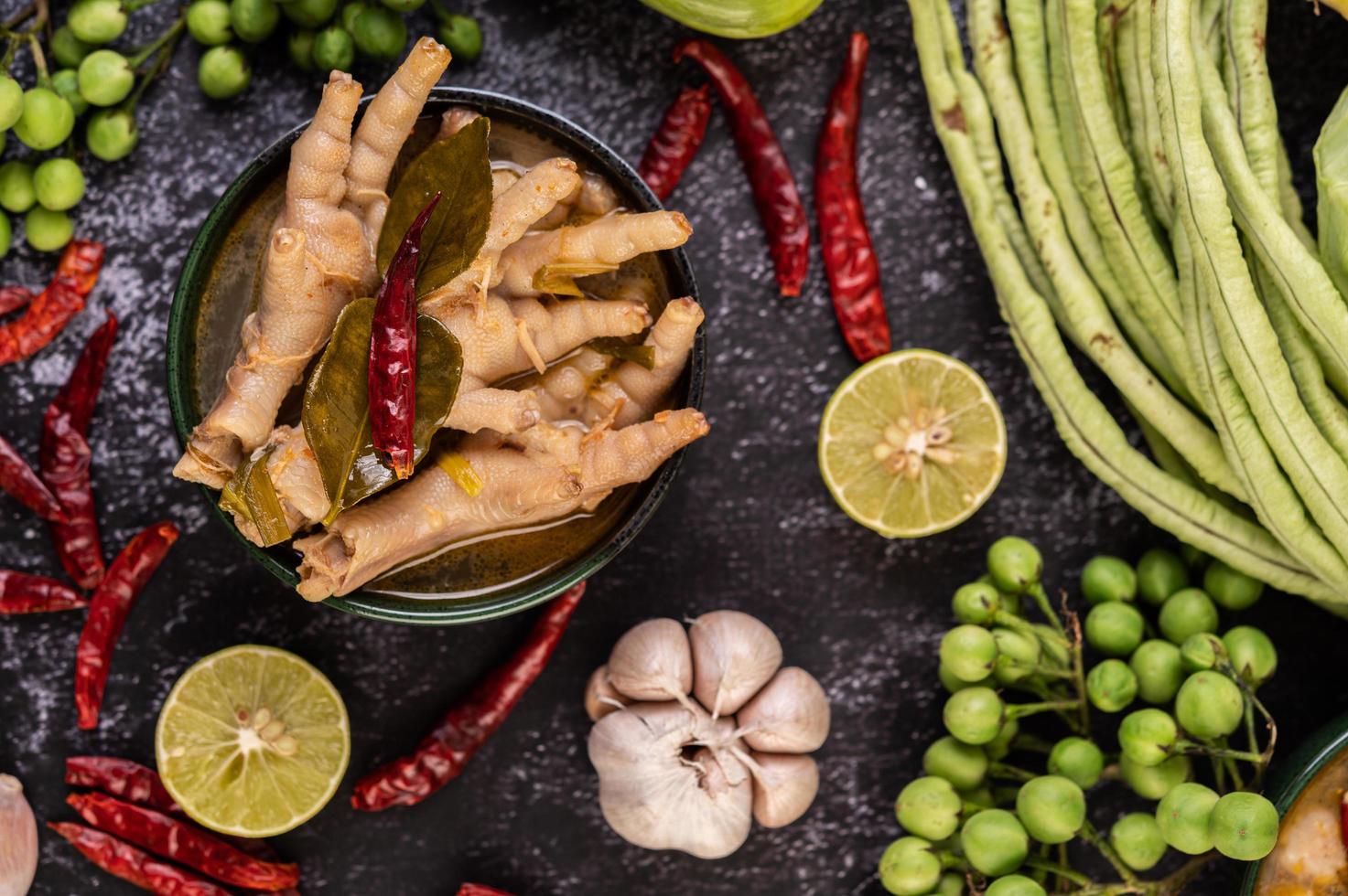 Rice noodles and chicken feet meal photo