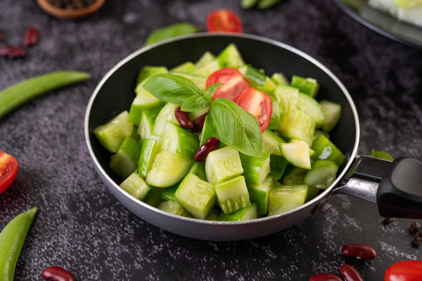 Cucumbers stir-fried with tomatoes photo