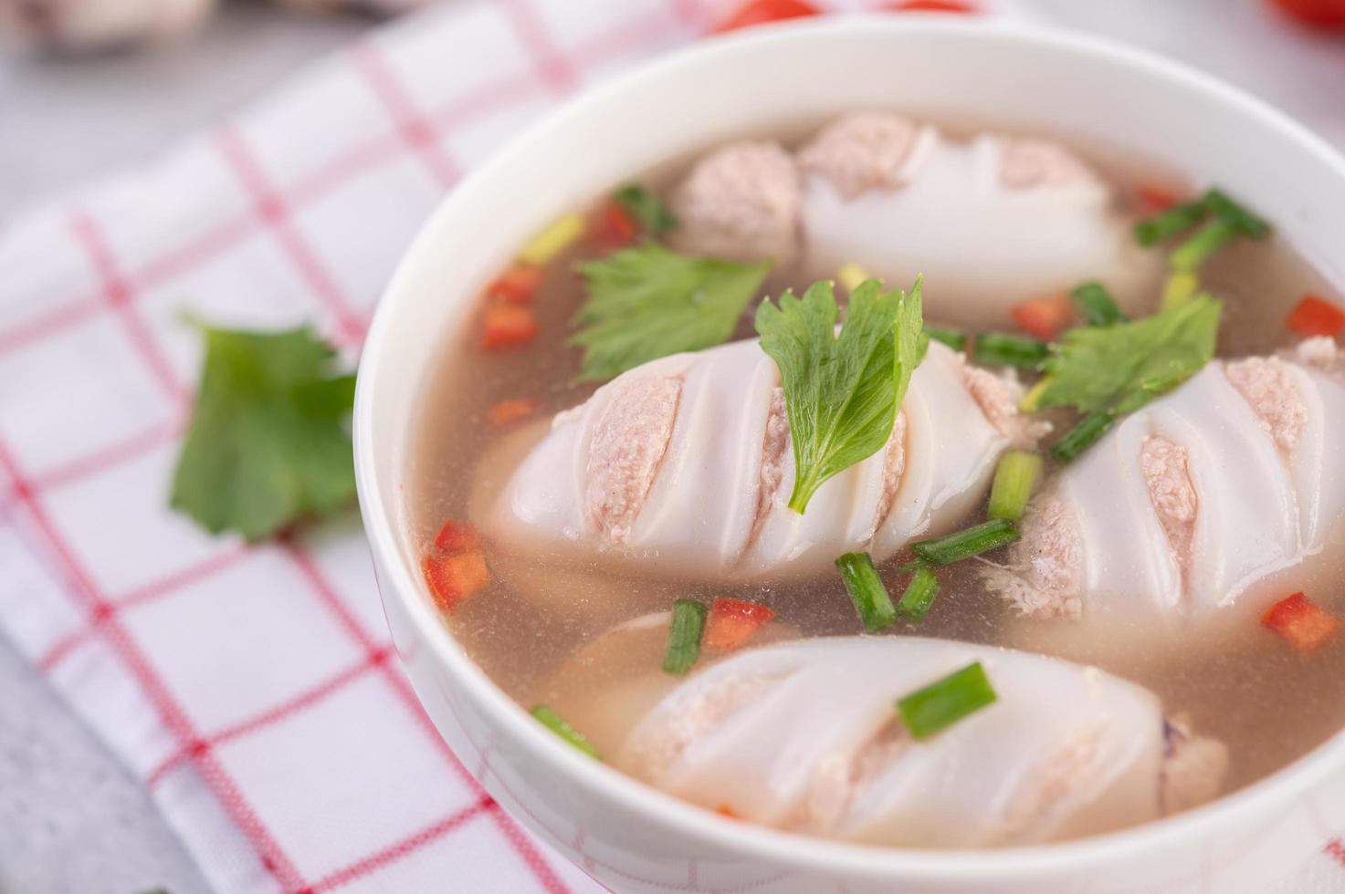 Squid soup bowl stuffed with pork photo