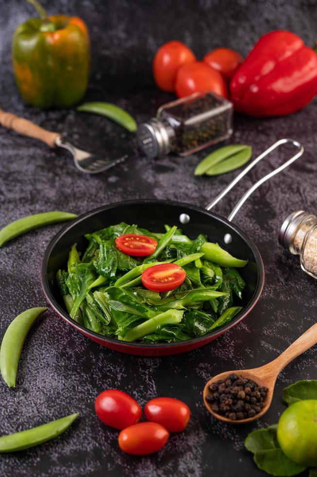 Stir-fried kale in a pan layout photo