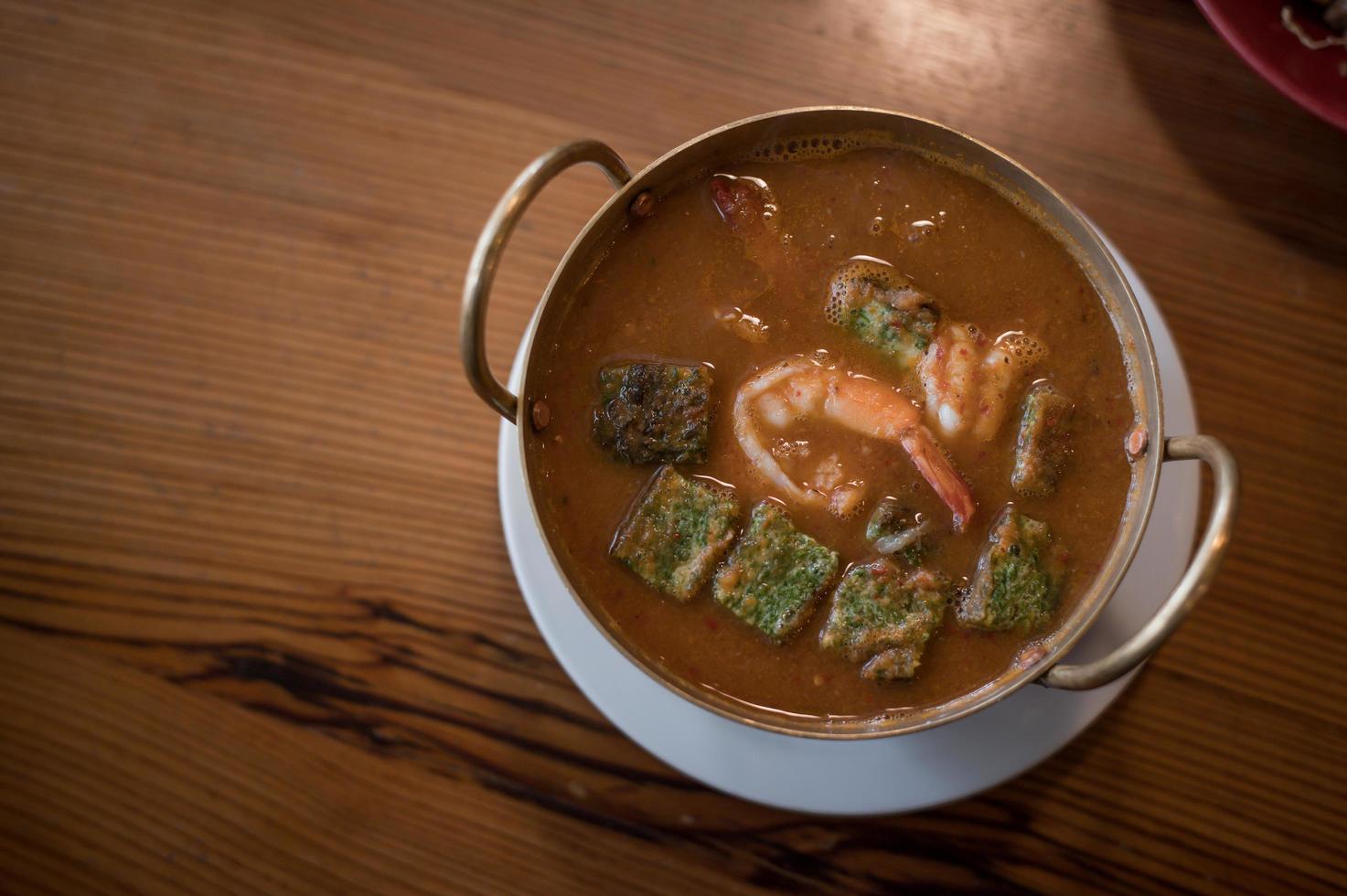 Cha-om sour soup with shrimps photo