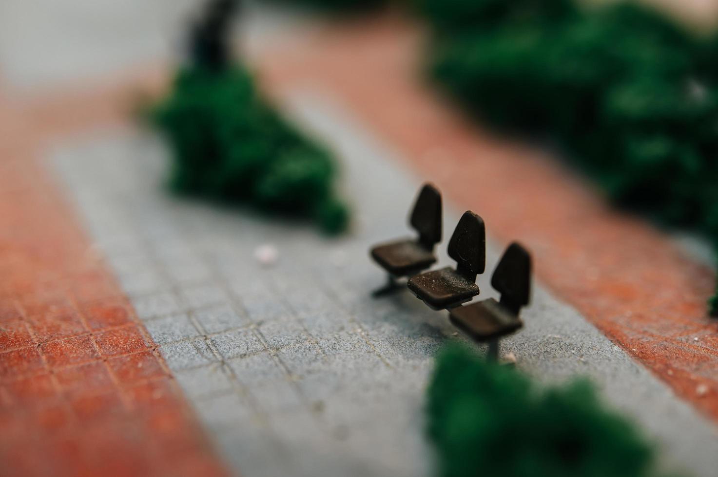 Close-up of small city park chairs photo