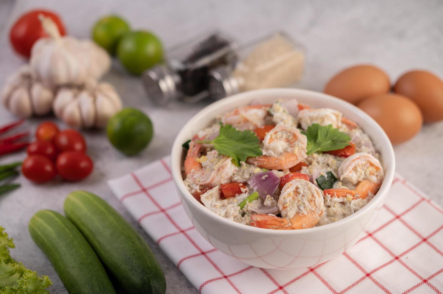 Shrimp salad with tomato and coriander photo