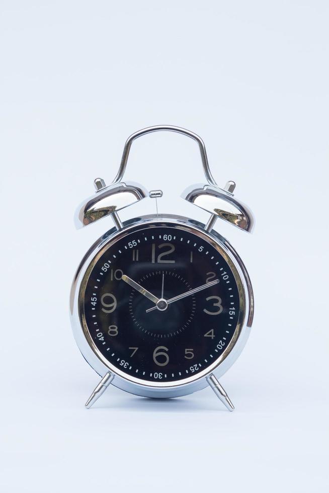 Alarm clock isolated on a white background photo