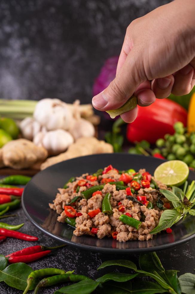 Stir-fried pork basil with vegetables photo