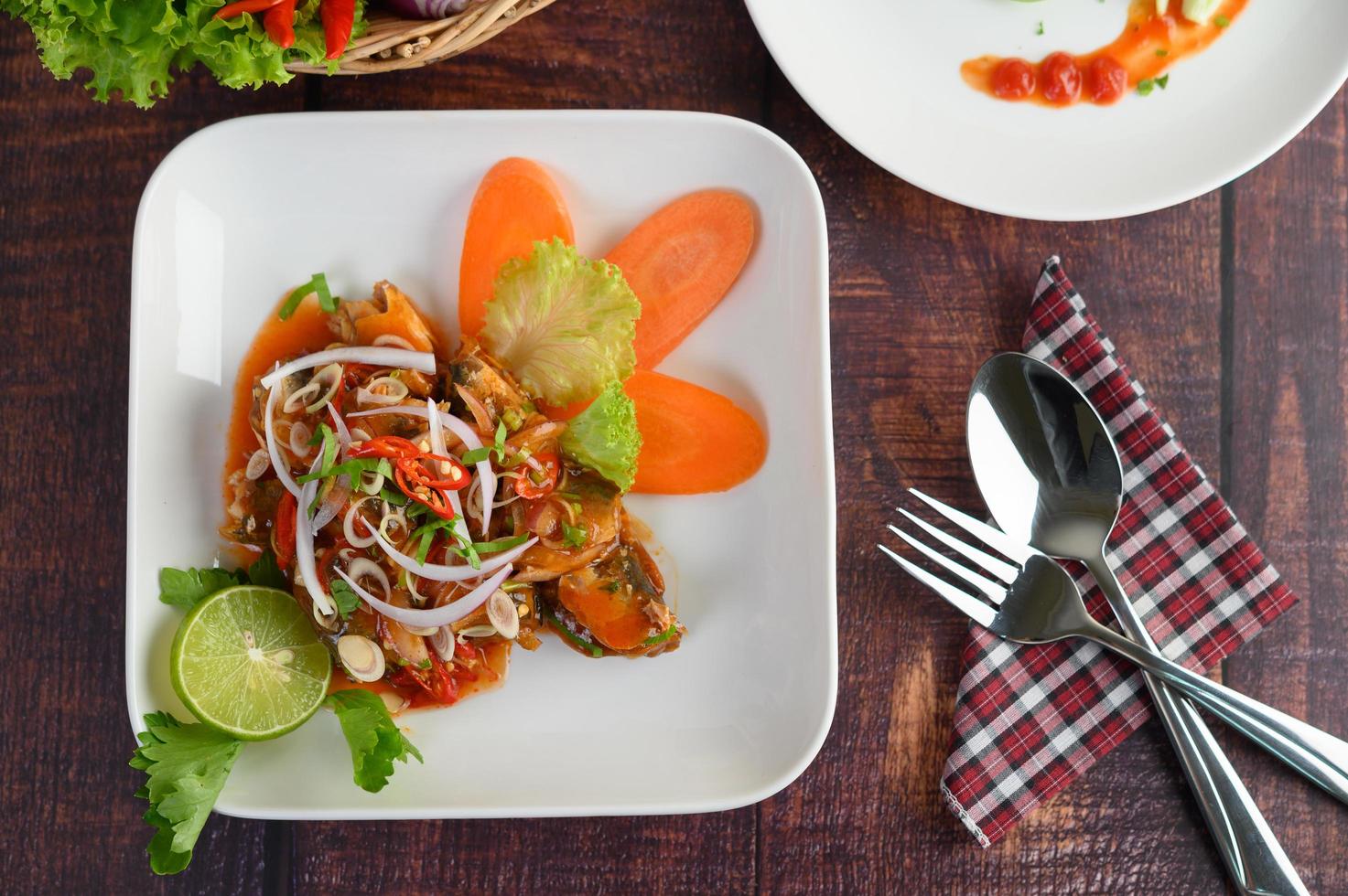 Spicy salad of sardines in sauce photo