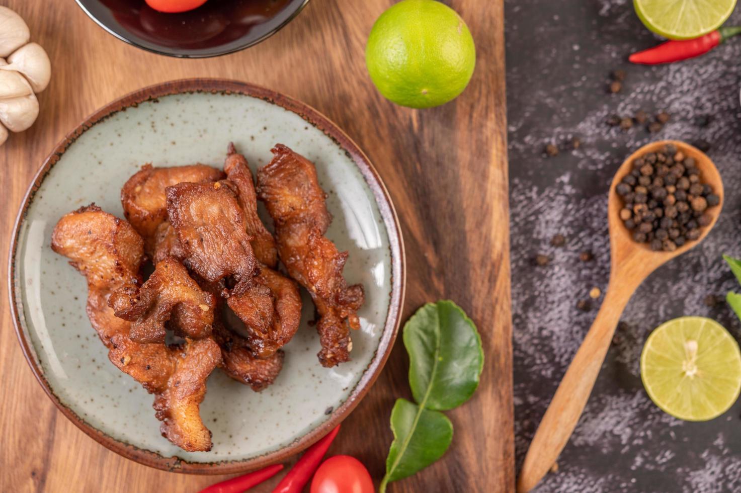 Pork cutlet with chilies and garlic photo