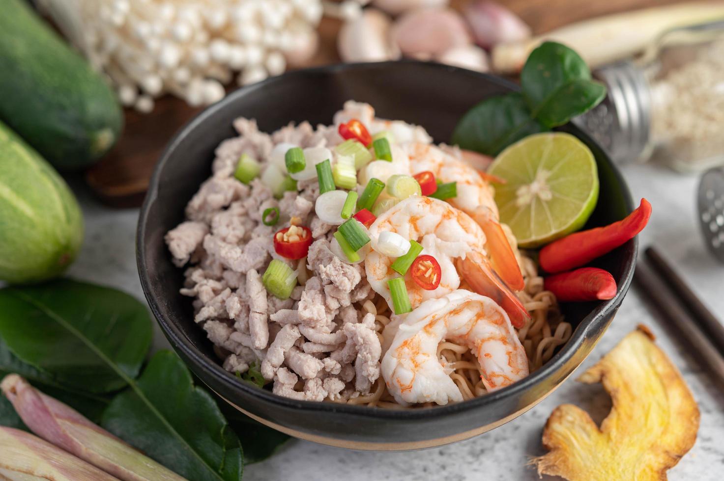 Instant noodles stir-fried with shrimp and pork photo