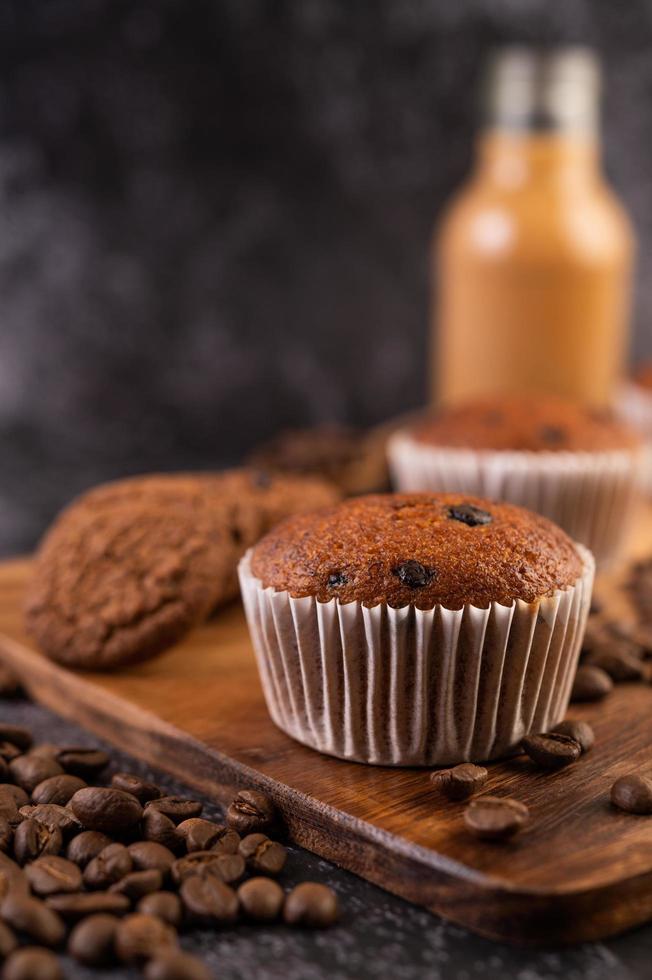 Banana cupcakes on a wooden board photo