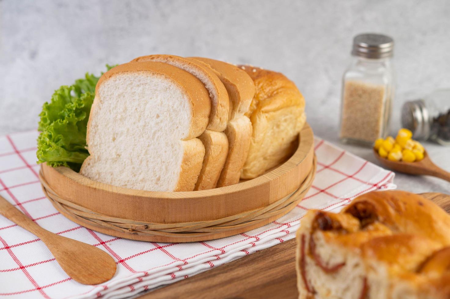 Various breads displayed on a table photo