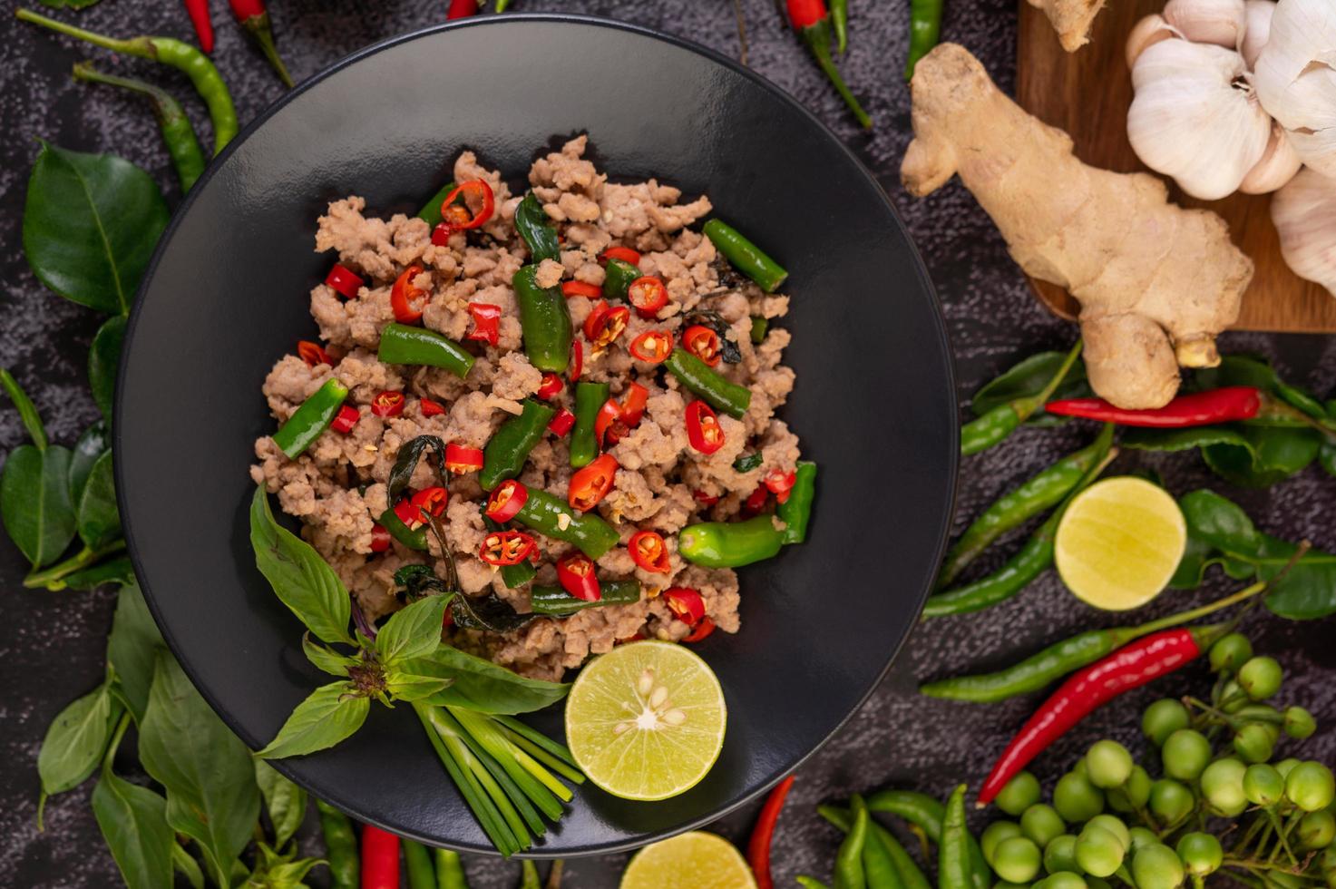 Stir-fried pork basil with vegetables photo