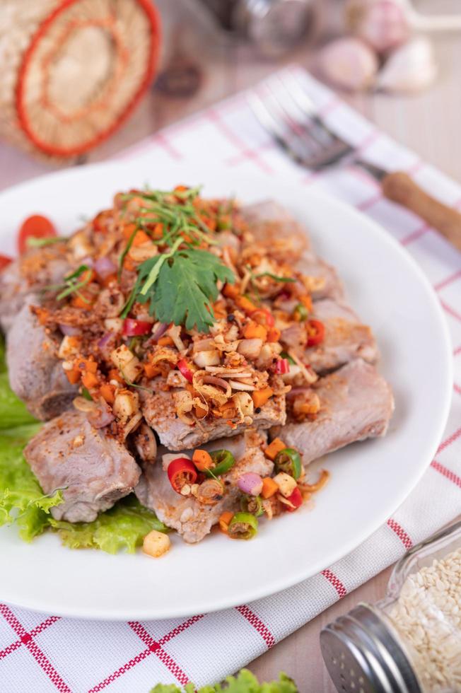 Spicy pork minced with tomatoes photo