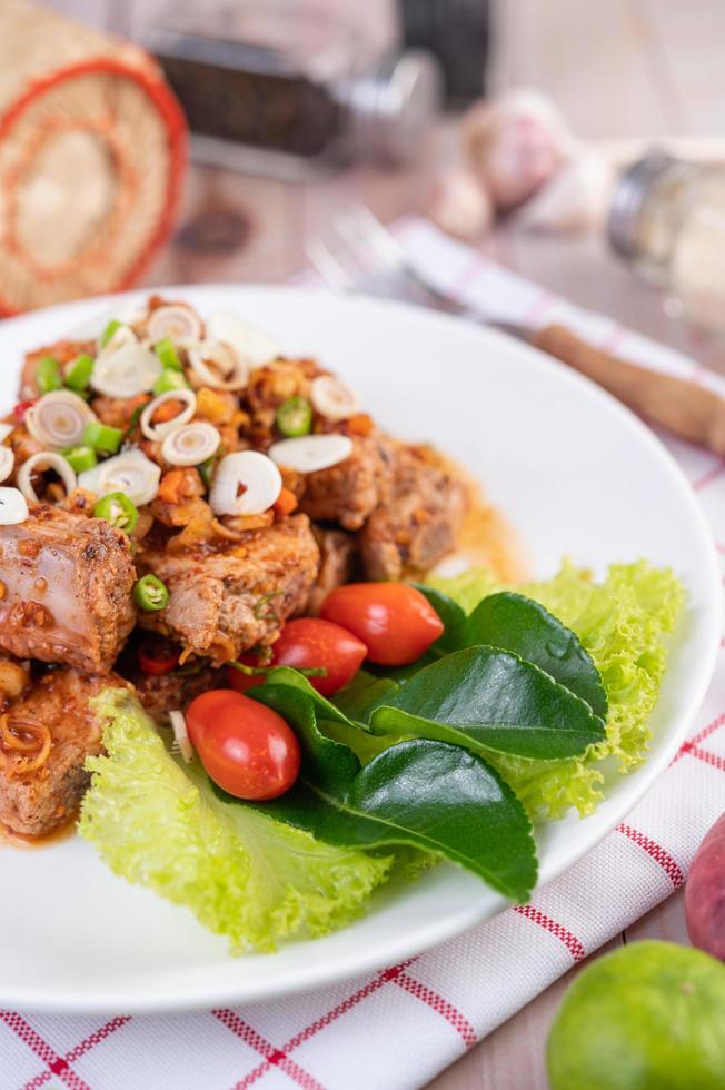 Spicy pork minced with tomatoes photo