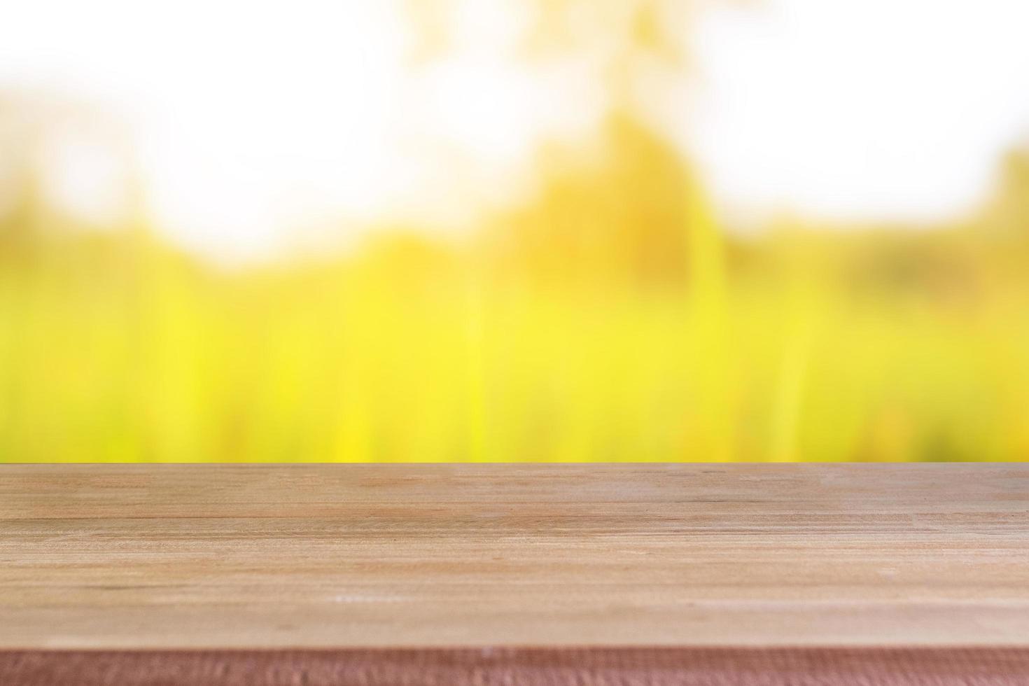 Empty wooden table outside photo