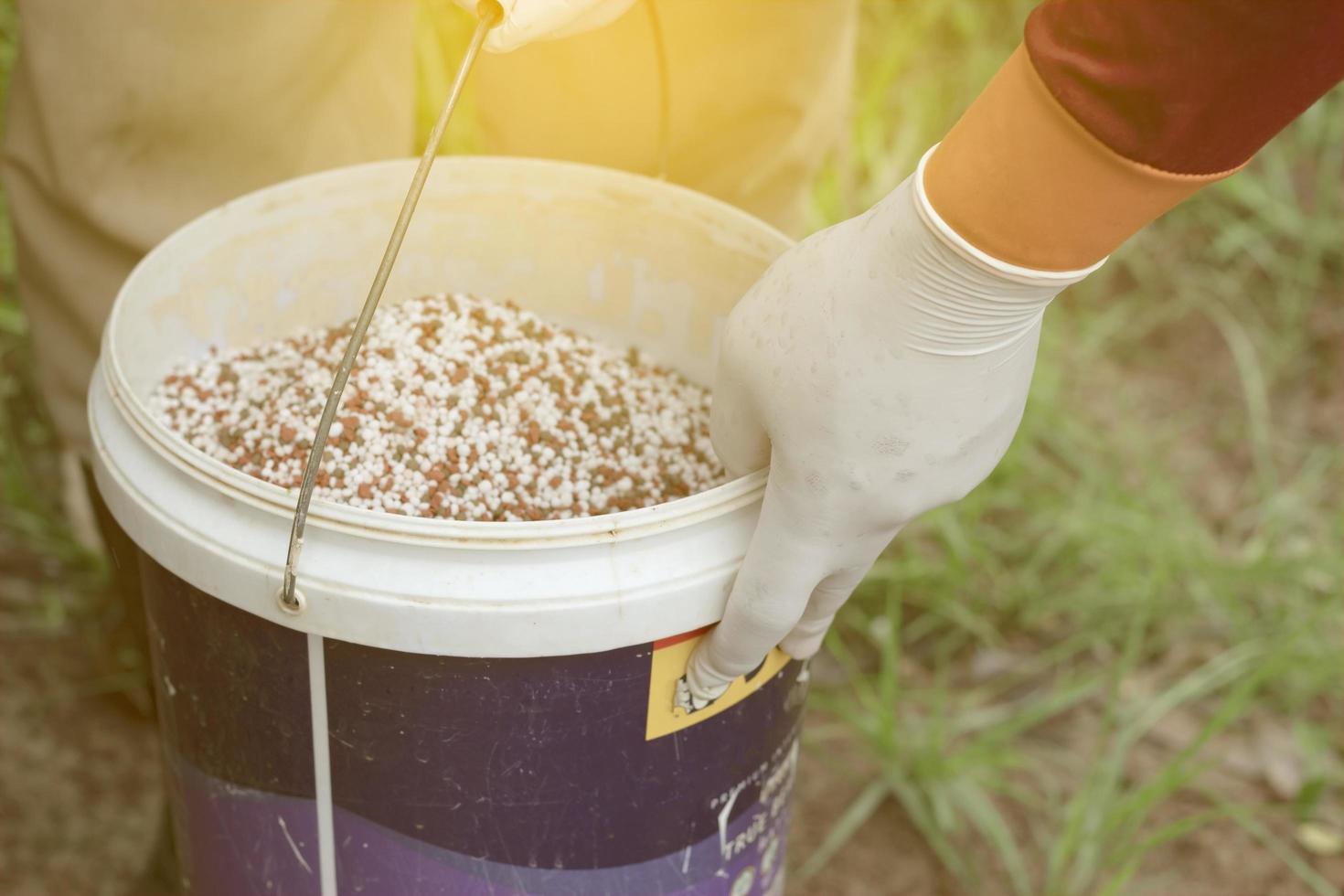 Bucket of fertilizer photo