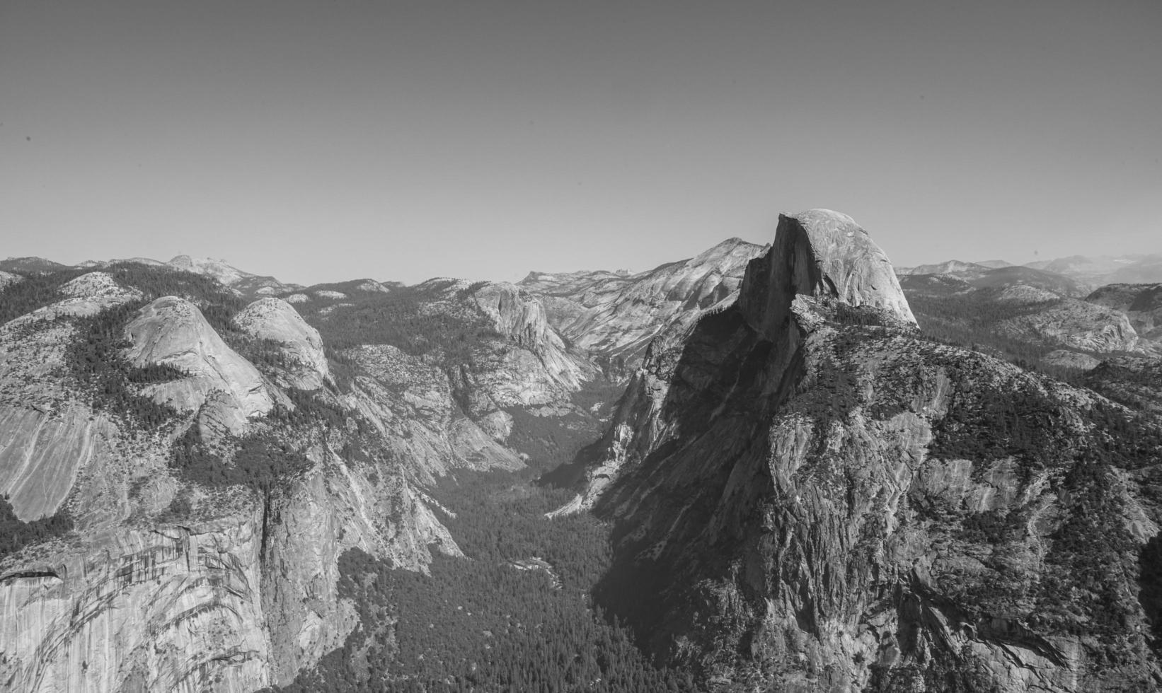 Grayscale photograph of mountains photo