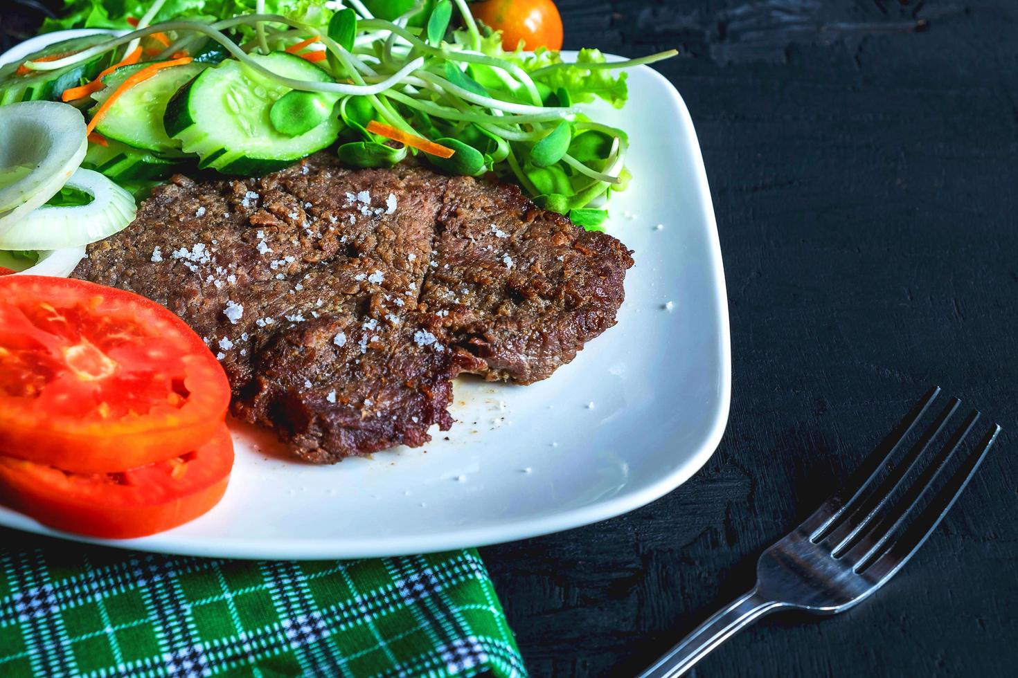 Steak and salad photo